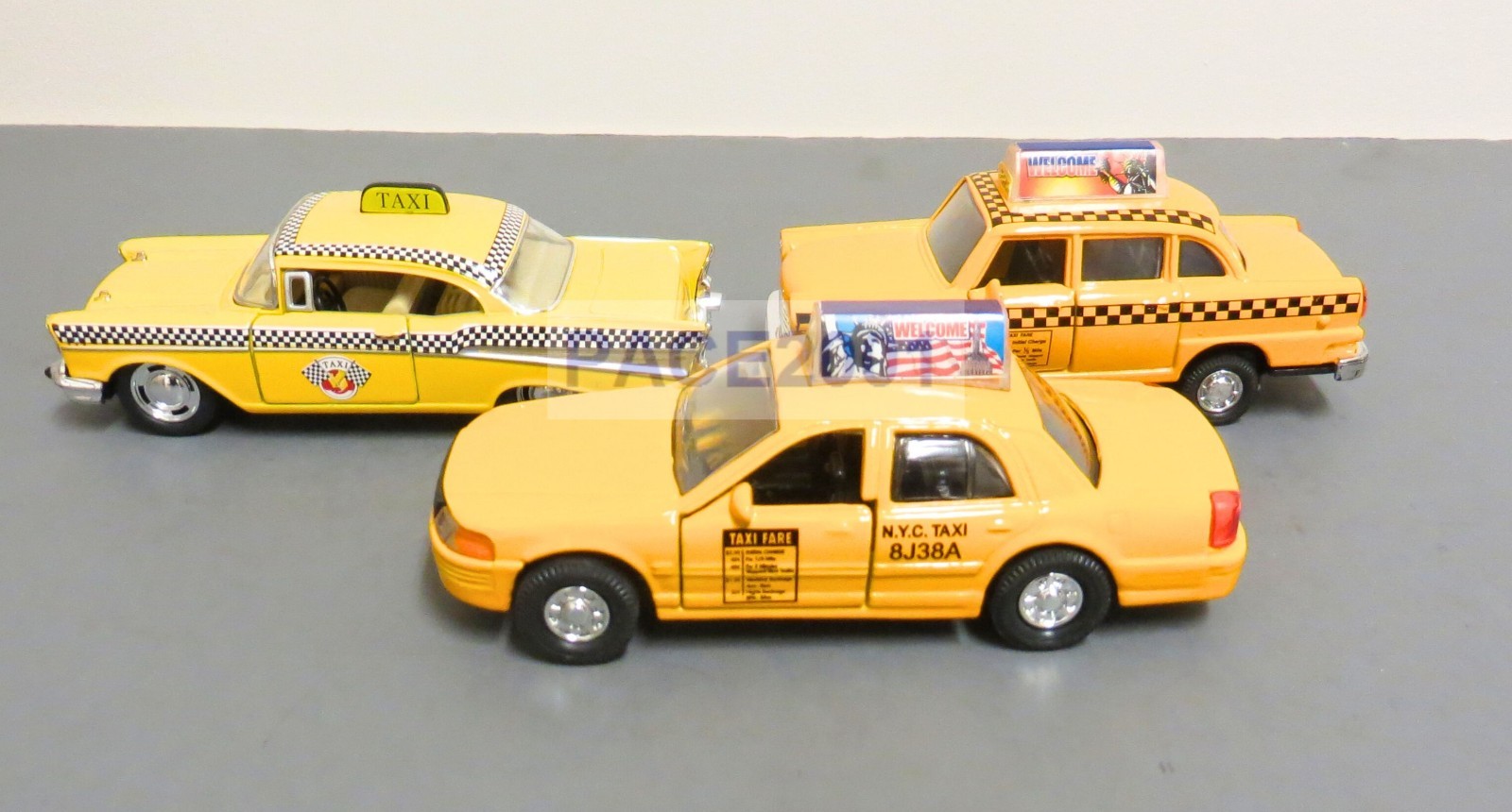 Lot of 3 Diecast Taxies with Pullback Action (57 Bel Air, Classic and Modern)