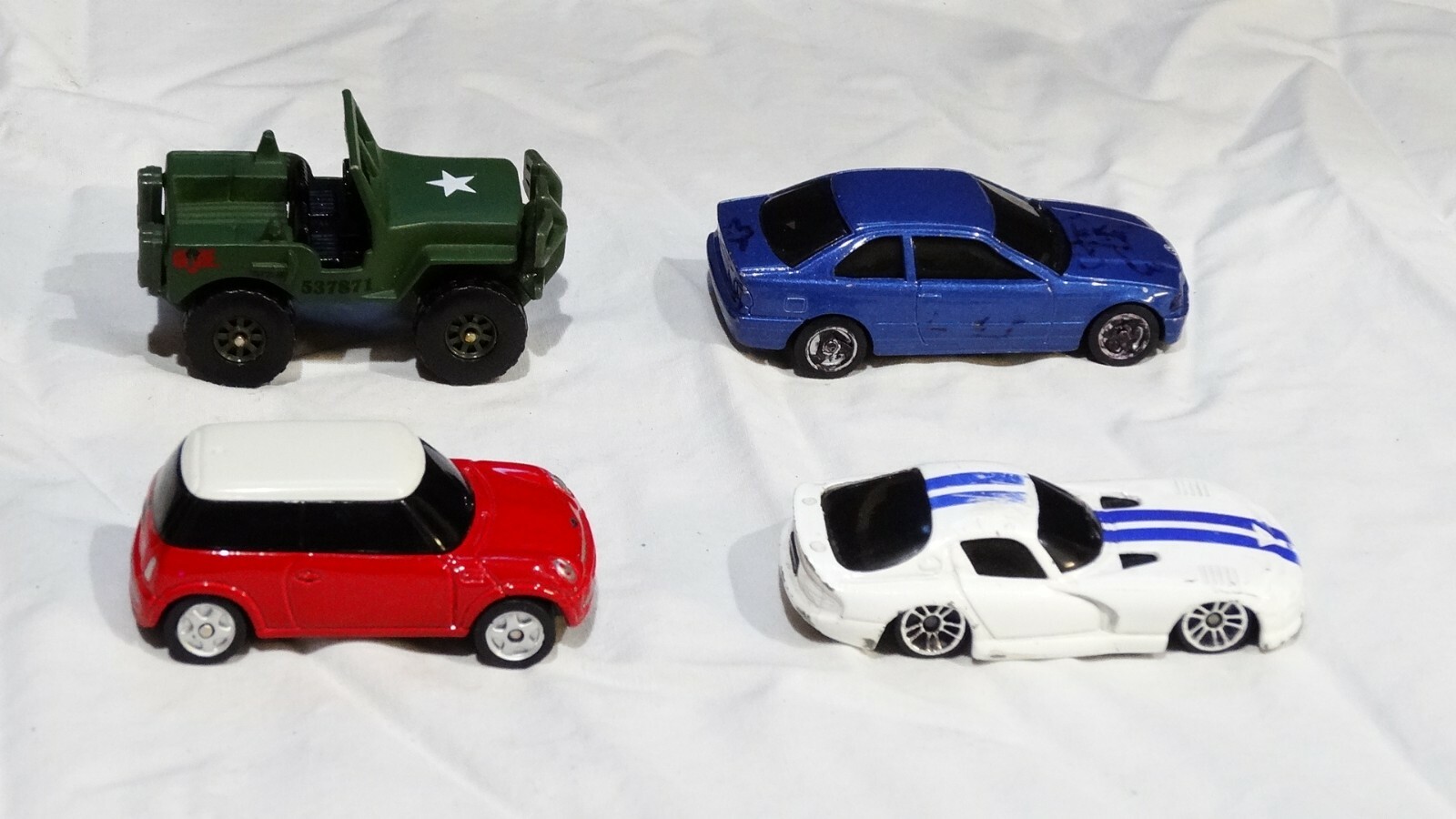 4 Diecast Maisto lot. In fair condition, Please see photos 