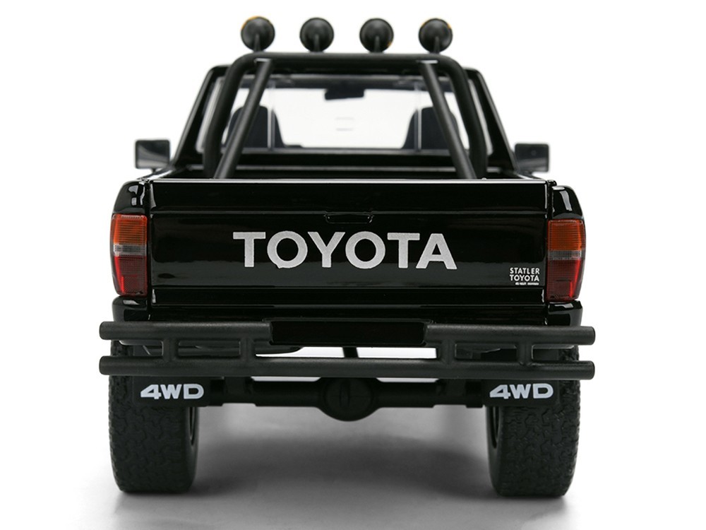 1985 TOYOTA SR5 PICKUP BLACK W/SKATEBOARD “BACK TO THE FUTURE” 1/24 JADA 36479