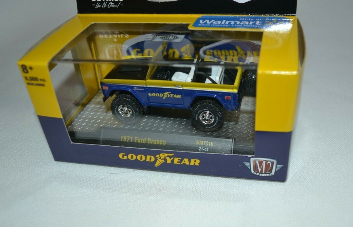 M2 MACHINES 2021 GOODYEAR – 1971 FORD BRONCO BLUE AND YELLOW WMTS16