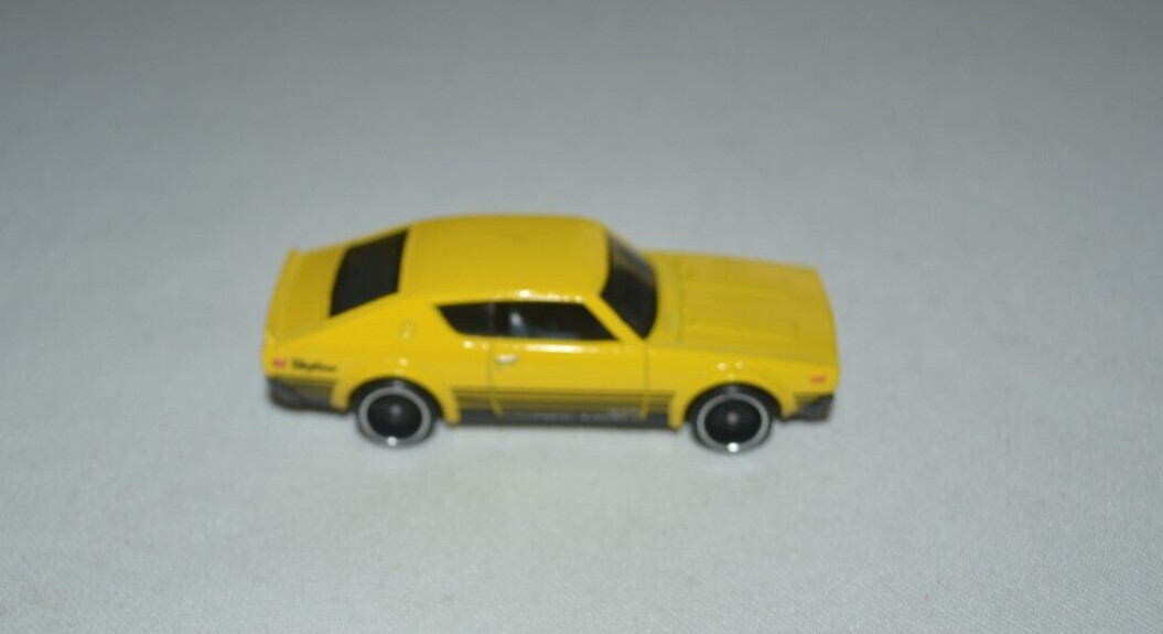 HOT WHEELS THEN AND NOW – NISSAN SKYLINE 2000 GT-R YELLOW LOOSE FREE SHIPPING