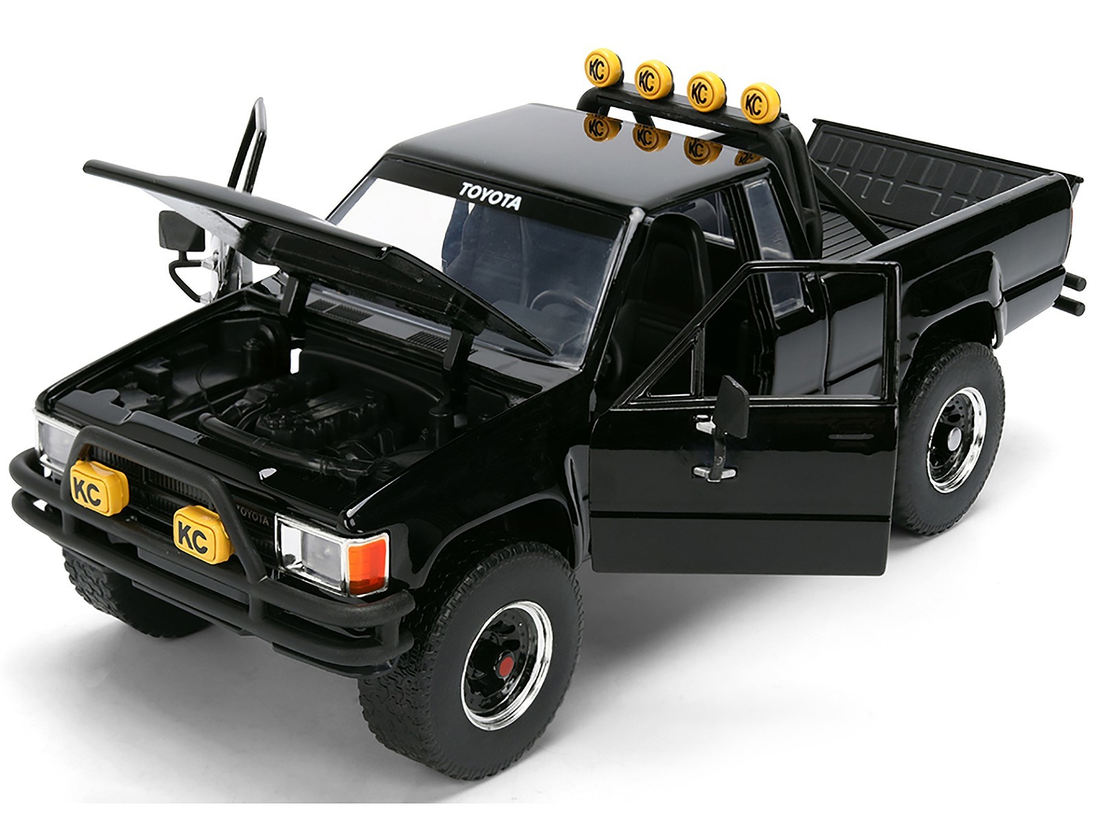1985 TOYOTA SR5 PICKUP BLACK W/SKATEBOARD “BACK TO THE FUTURE” 1/24 JADA 36479