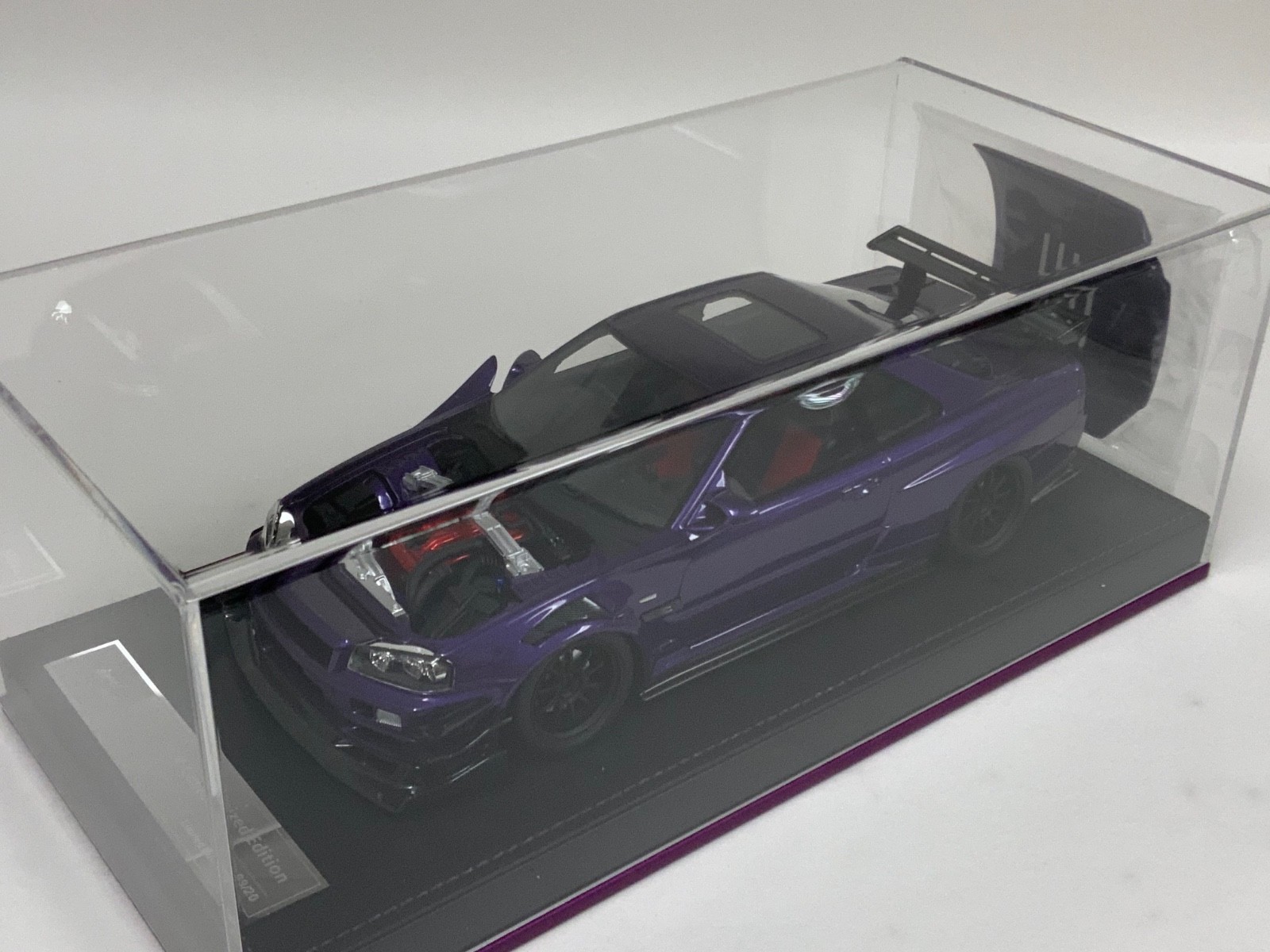 1/18 IVY Nissan R34 customized with Full Engine Purple leather base 20 pieces