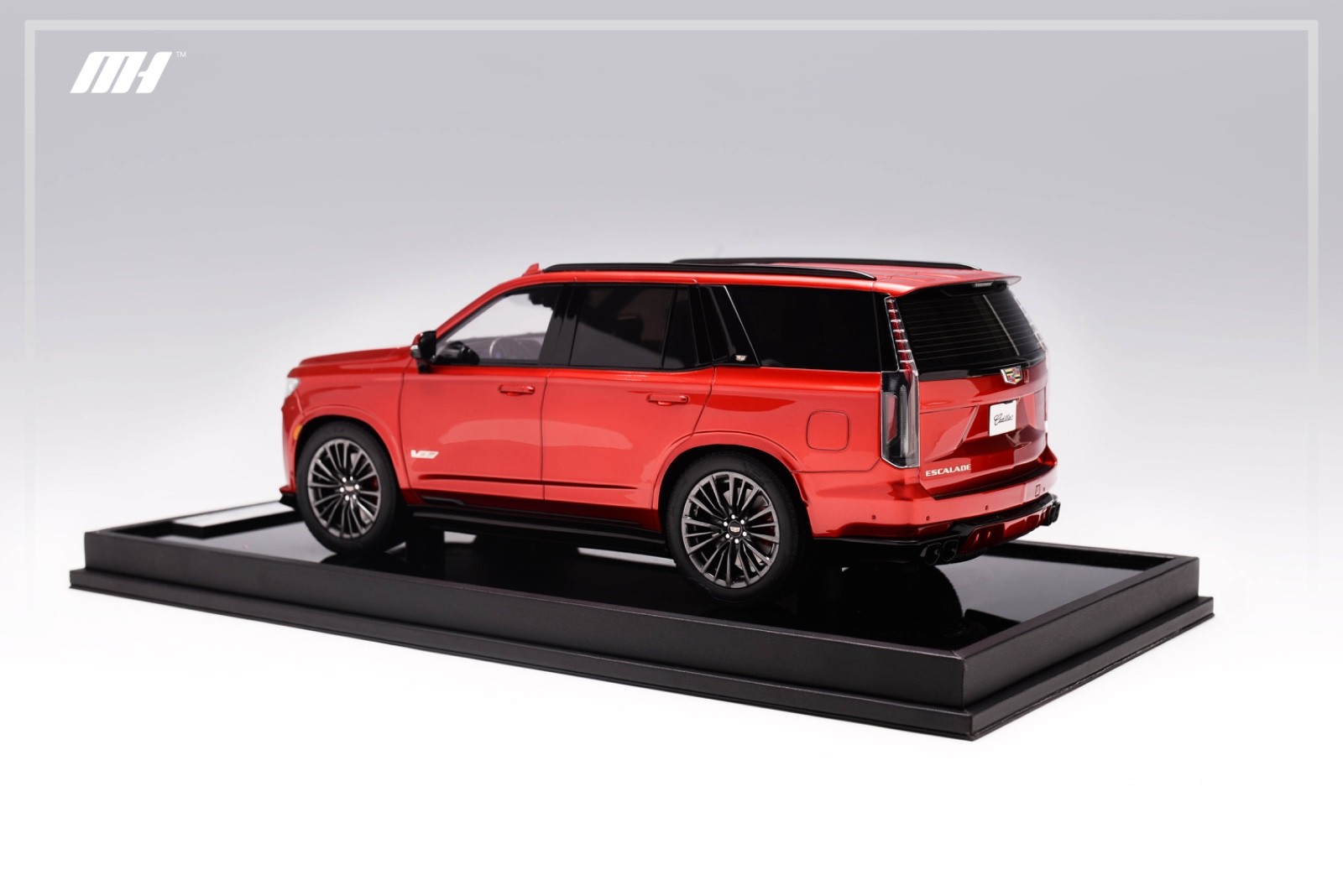 1/18 Motorhelix Cadillac Escalade V from 2022 in in red on Carbon Base