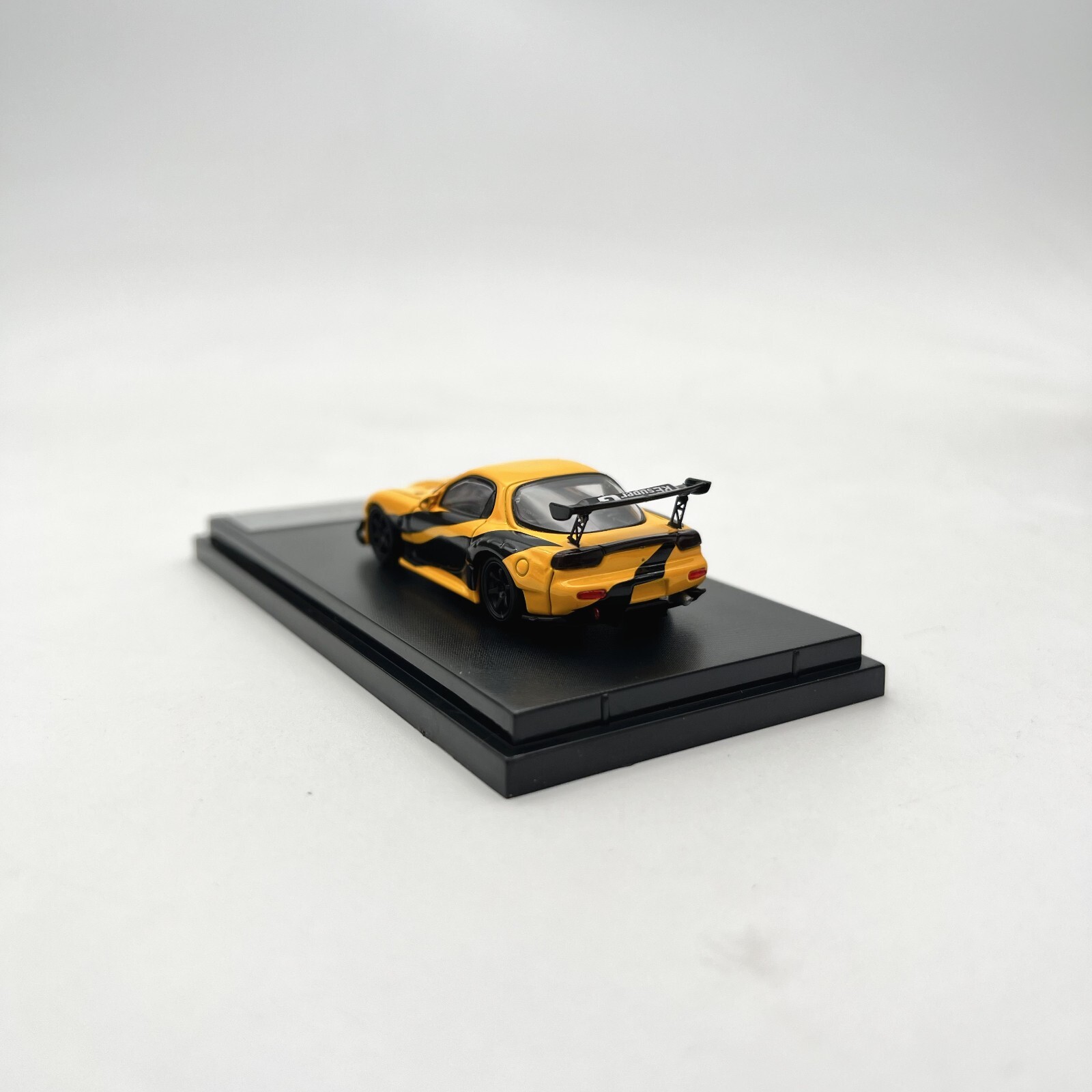 Master 1:64 Mazda RX-7 (Yellow/Black) Diecast Model Car