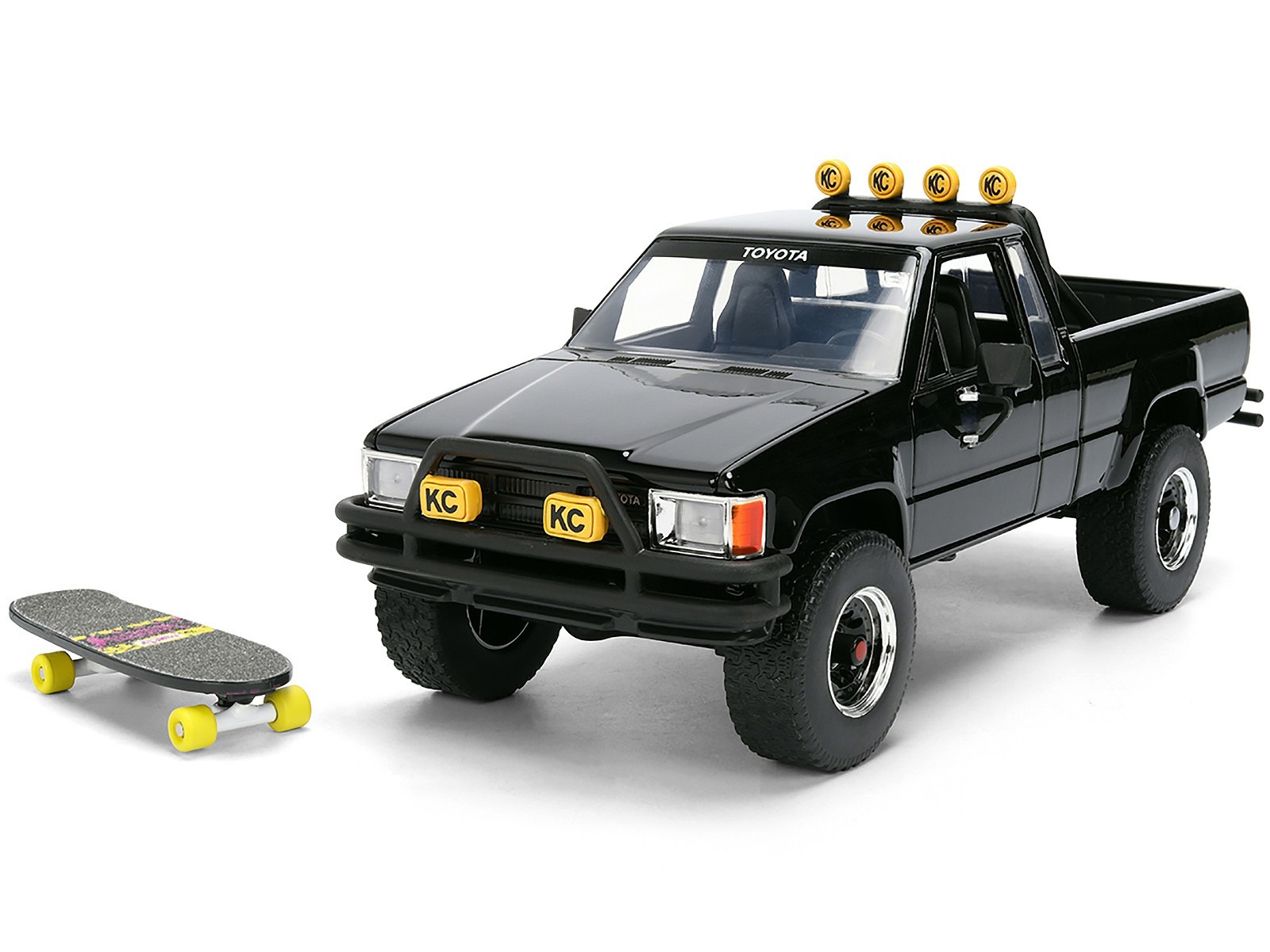 1985 TOYOTA SR5 PICKUP BLACK W/SKATEBOARD “BACK TO THE FUTURE” 1/24 JADA 36479