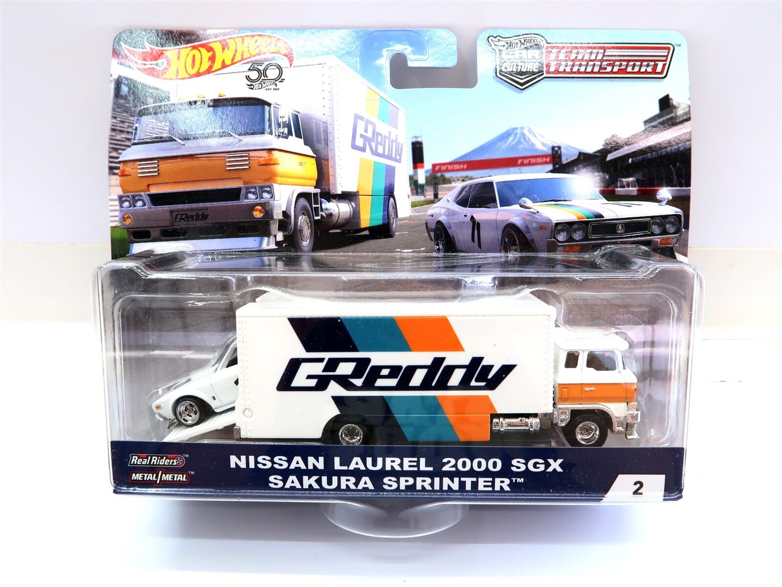 Hot Wheels NISSAN LAUREL 2000 SGX SAKURA SPRINTER 2018 Greddy Team Transport