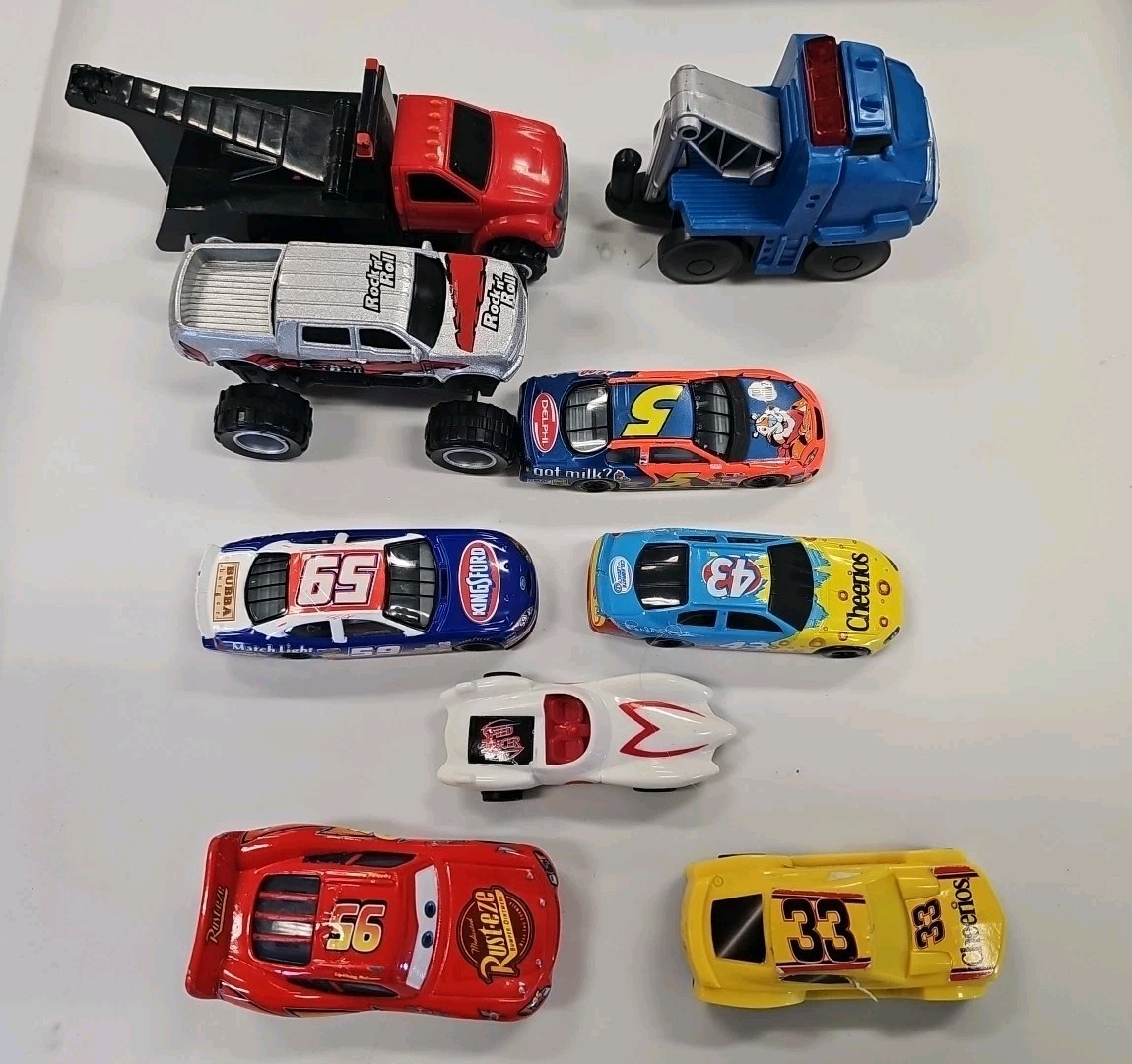 Lot Of 9 Assorted Die-Cast And Plastic Toy Cars Assorted manufacturing.