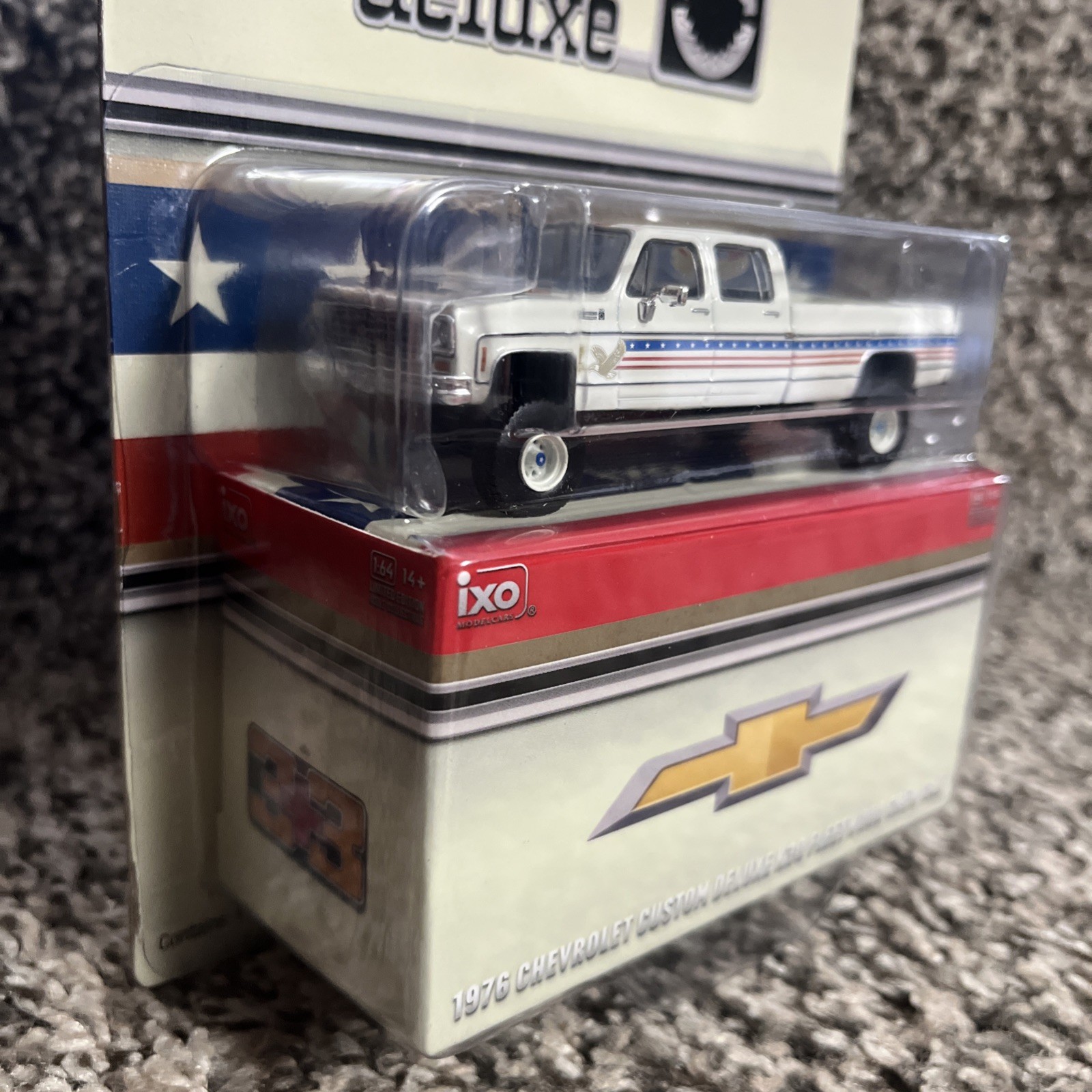 1:64 IXO 1976 Chevrolet Custom Deluxe K30 Fleetside Crew Cab- July 4th Exclusive