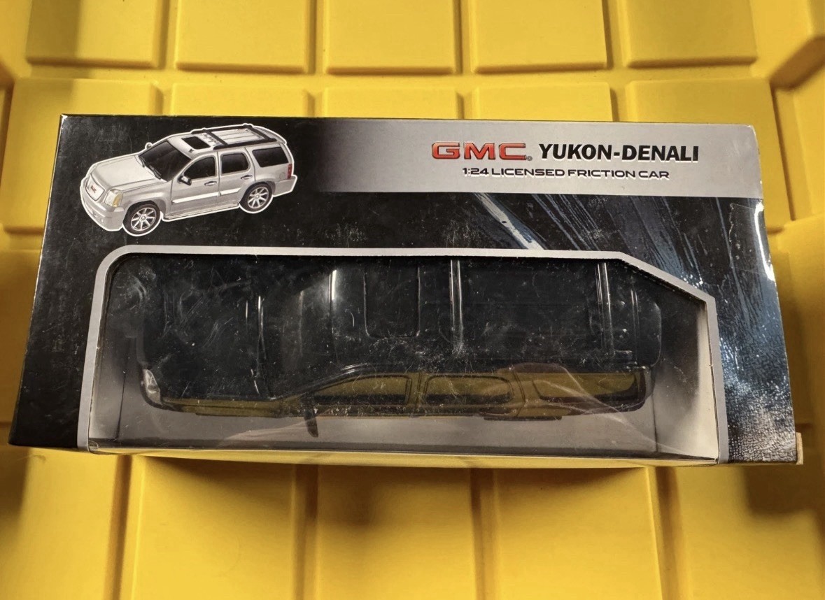 GMC Yukon Denali 1:24 Licensed Friction Car Black Diecast Model
