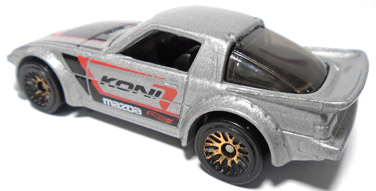 2011 HOT WHEELS MAZDA RX-7 KONI SILVER 2 5/8″ DIECAST RACE CAR WITH BLACK & RED