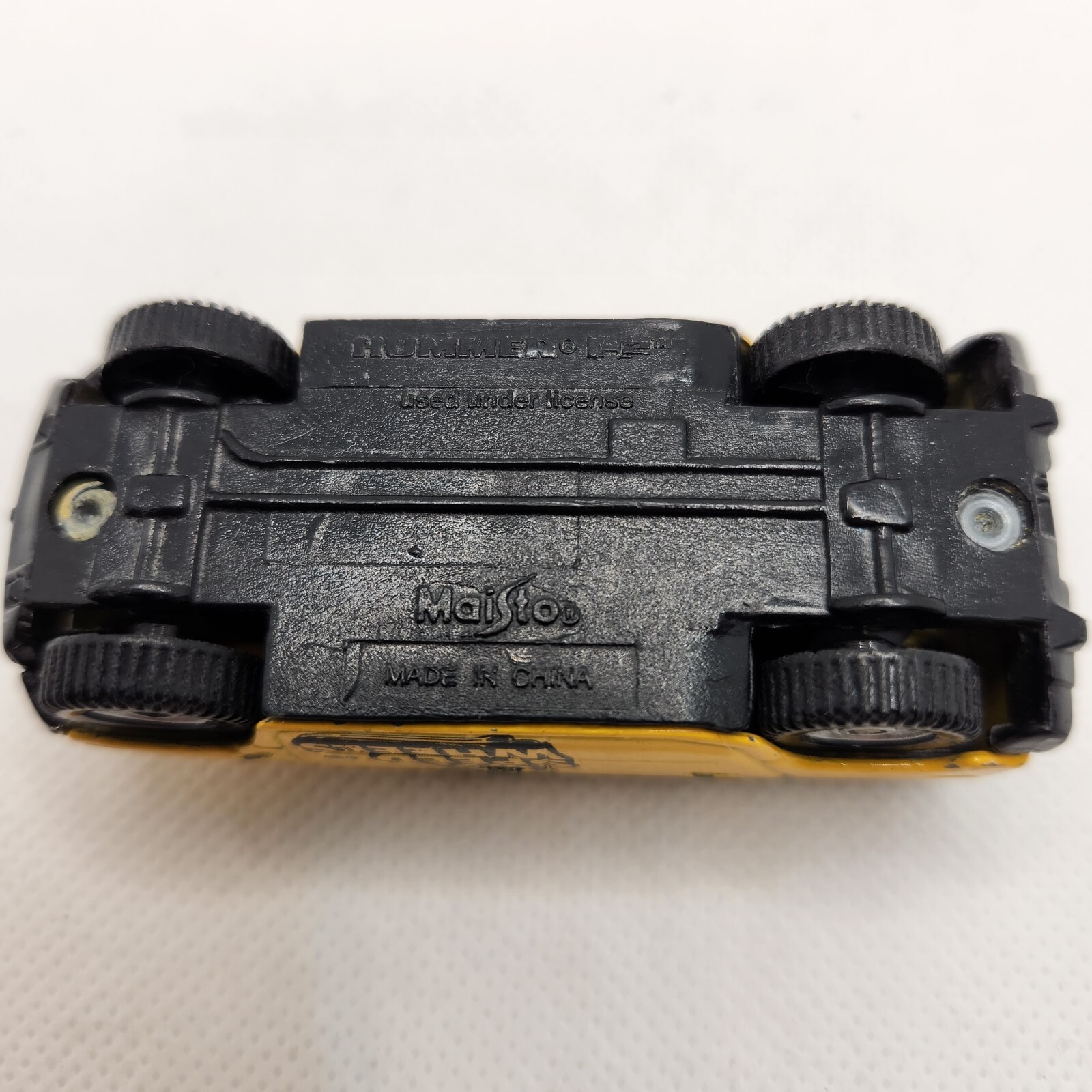 Maisto Hummer H2 Speed Wheels Yellow Die-cast Toy Car 1:64