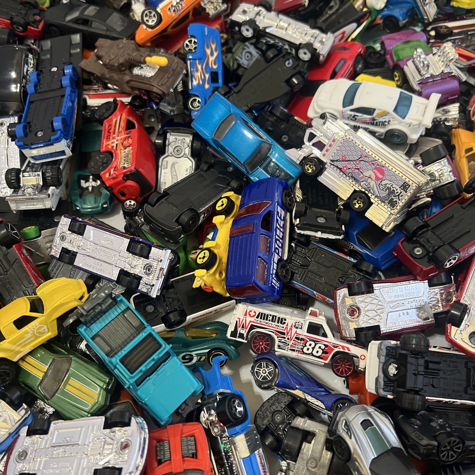 30 LBS Pounds of pure hotwheels. There are many different years and castings.