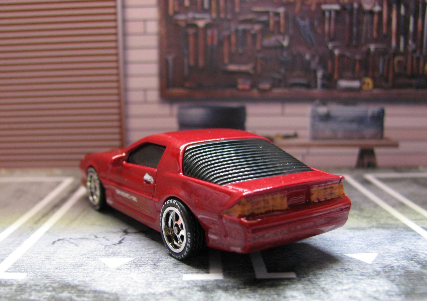 2025 Maisto Red 1985 Chevy Camaro IROC-Z, w/Real Riders Wheel Swap