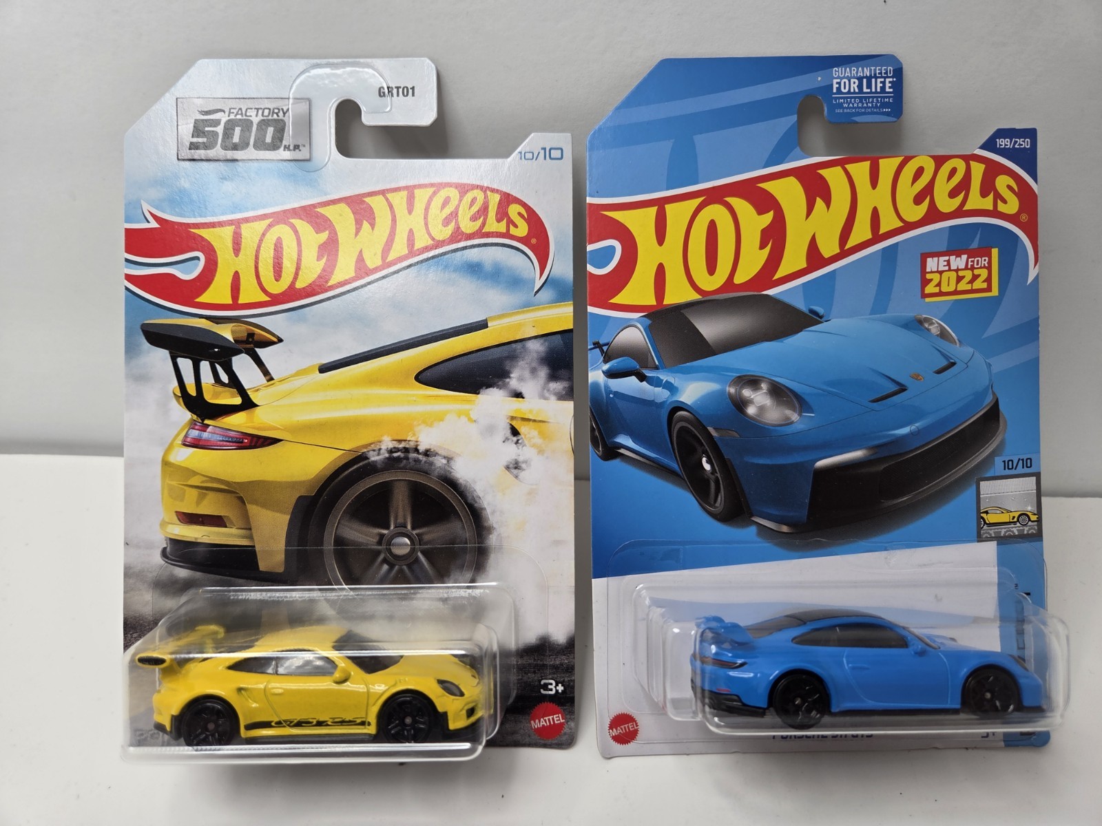 Hot Wheels Porsche 911 GT3 RS yellow Factory 500 And Blue New For 2023 Lot Of 2