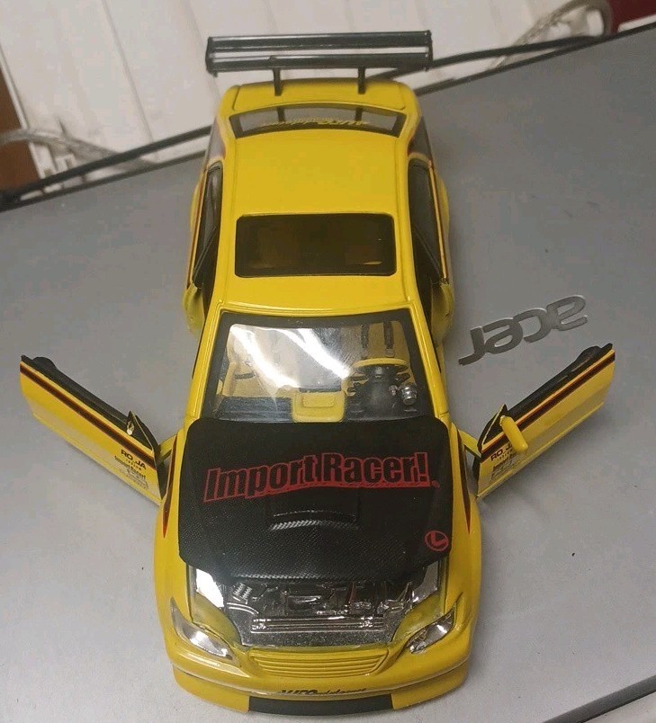 Jada Toys Dub City Import Racer! Lexus IS300 Toyota Altezza Yellow/Black 1/24