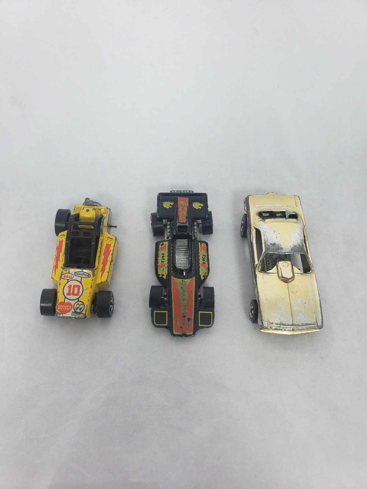 Lot of 3 Vintage Hotwheels. 1969 – 1975 Hemi Hauler, Redline, Rock Buster