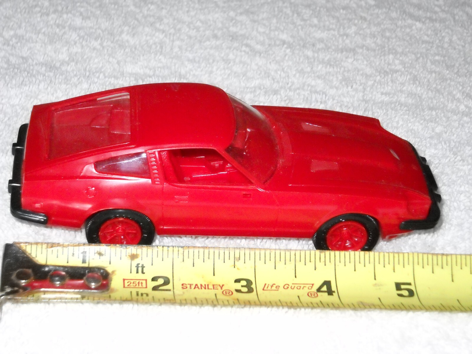 MMI Plastic 1980 Red Car, Nissan, Good Condition, Please see the photos