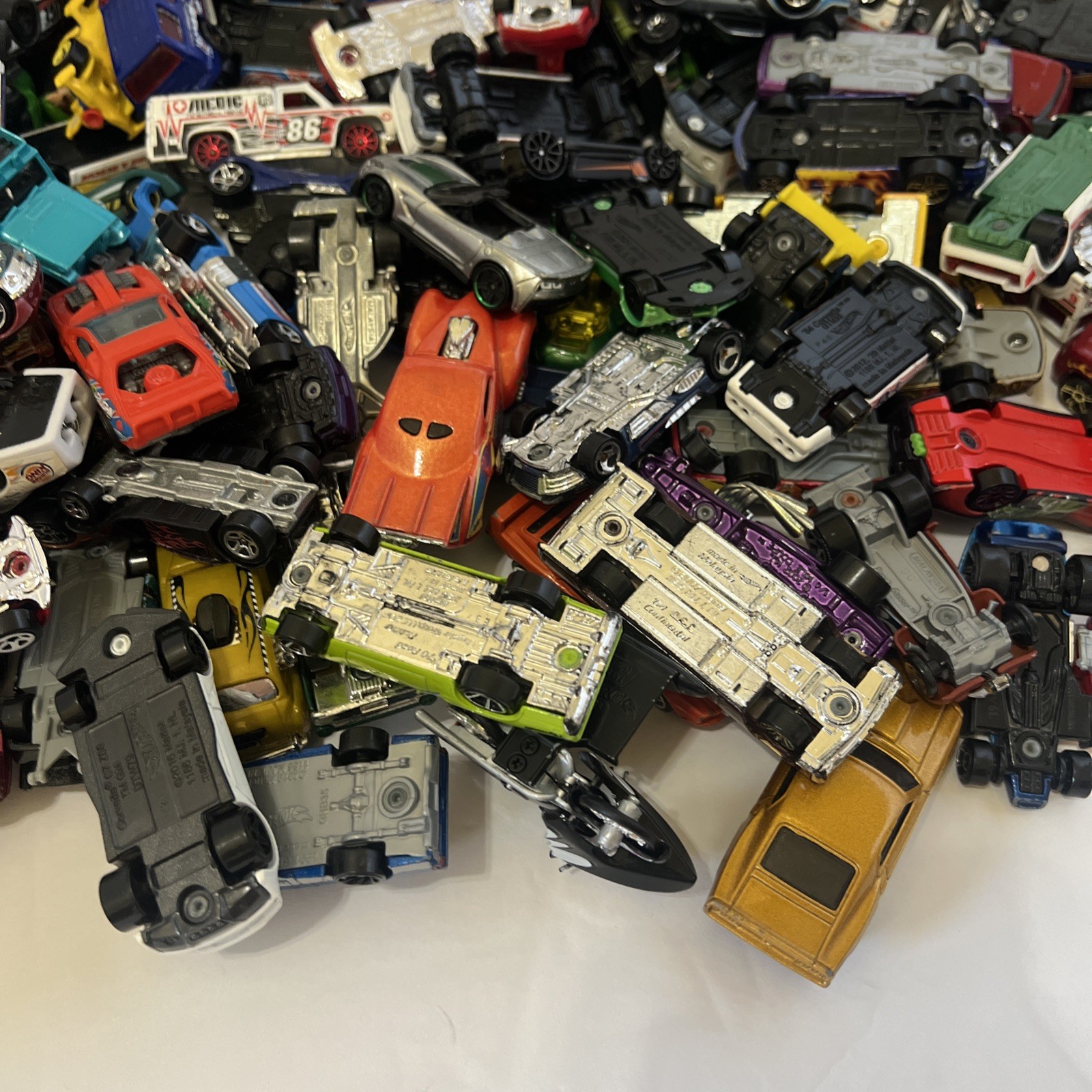 30 LBS Pounds of pure hotwheels. There are many different years and castings.