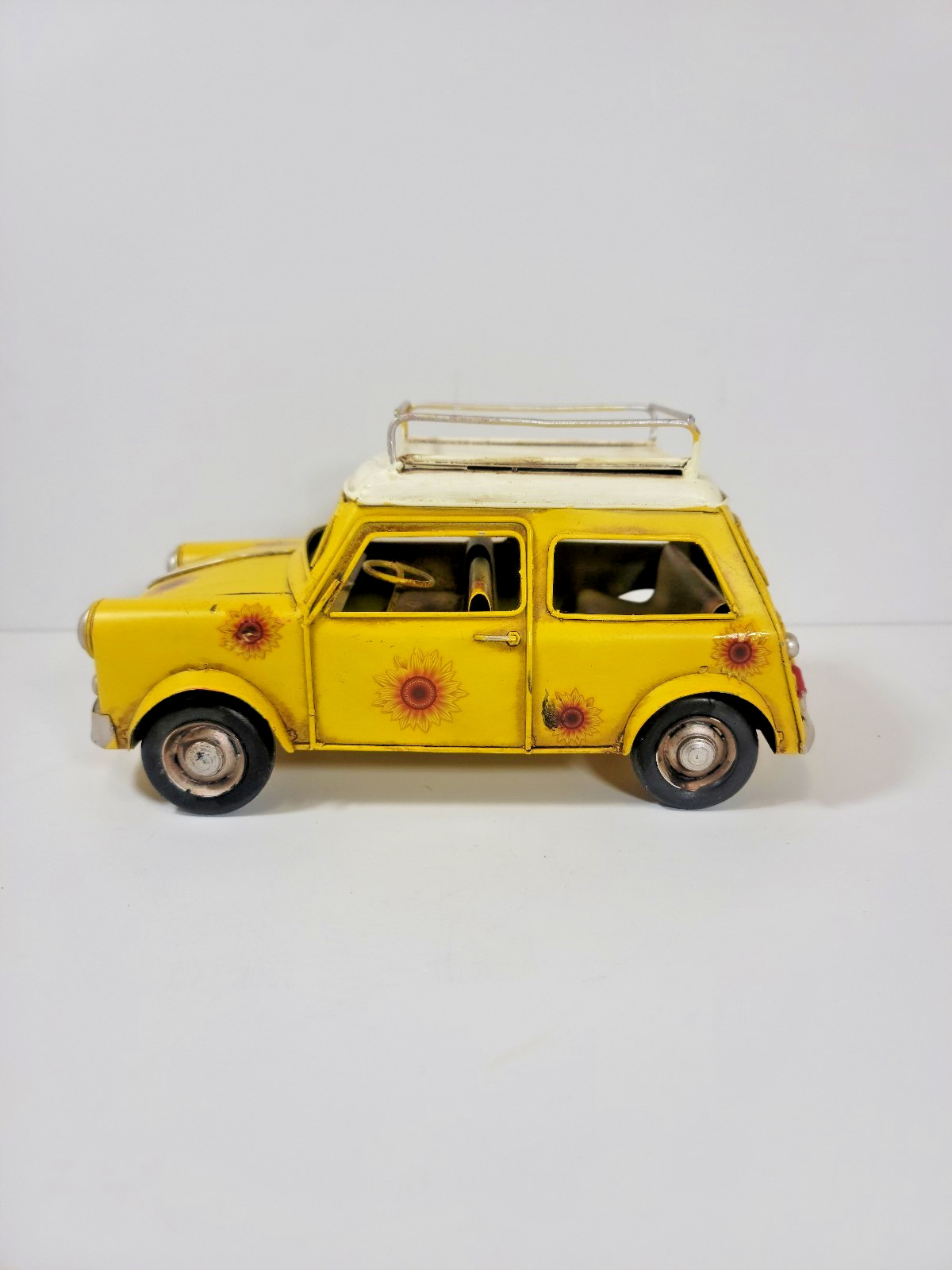 The Spring Shop Yellow Metal Mini Car with Sunflowers – Distressed Vintage Decor