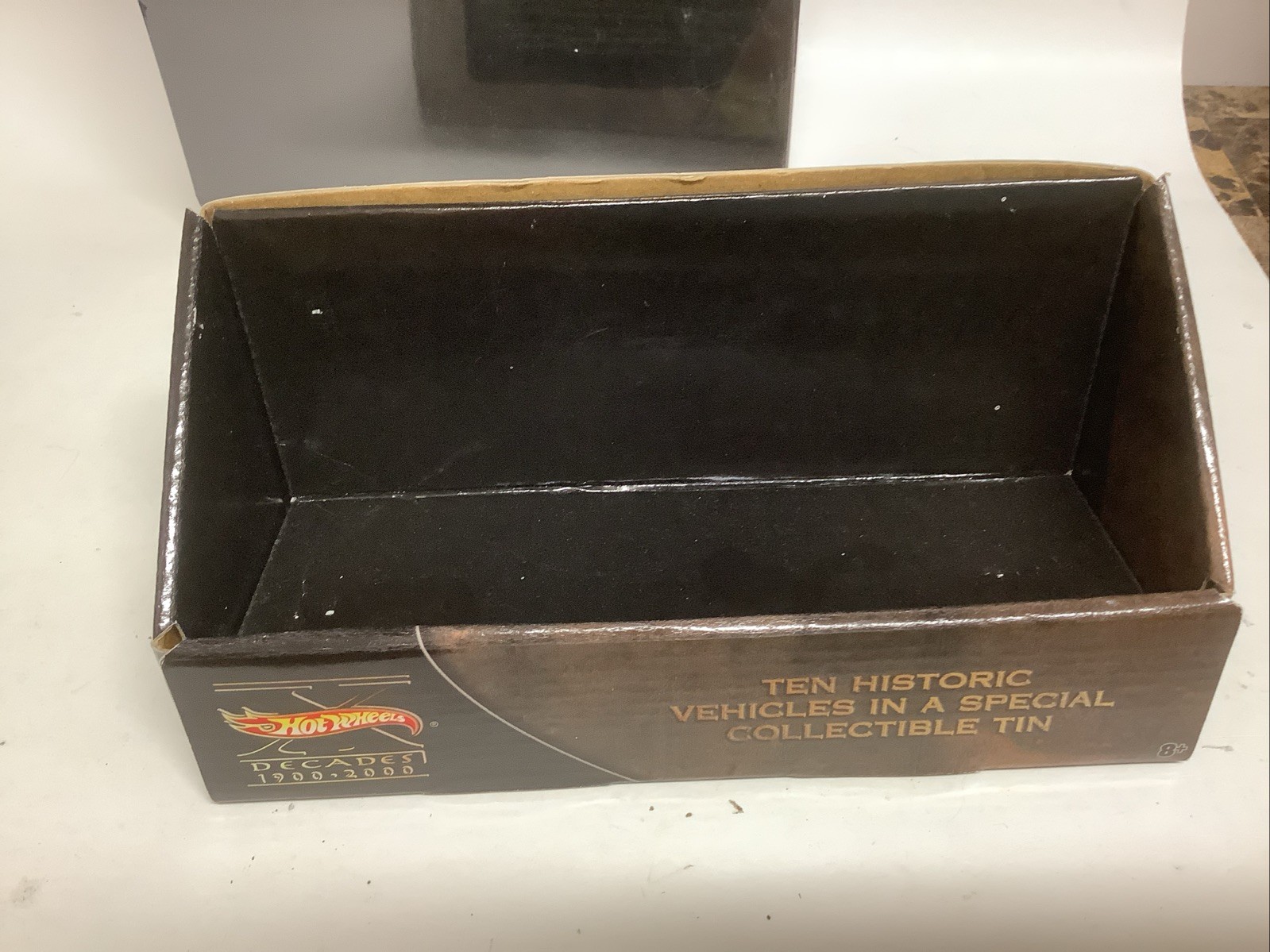 Hot Wheels Decades 1900-2000 Ten Vehicles Cars In Tin with Stand Box