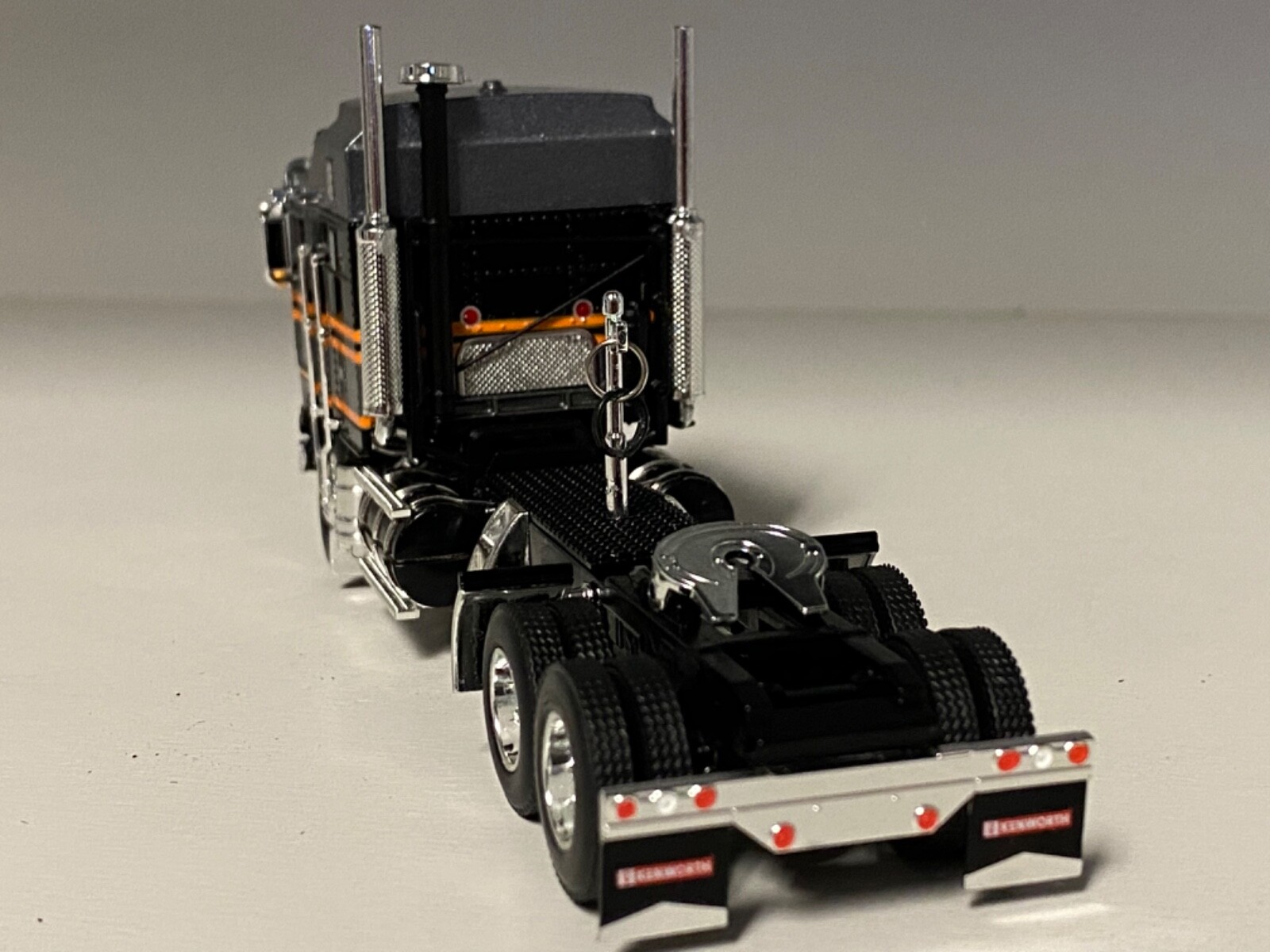 DCP 1/64 SILVER BLACK ORANGE KENWORTH K100 AERODYNE LONG FRAME