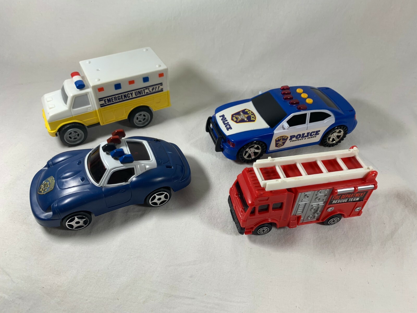 Lot of 4 Safety Service Toy Cars Police Fire Rescue Ambulance Emergency Response