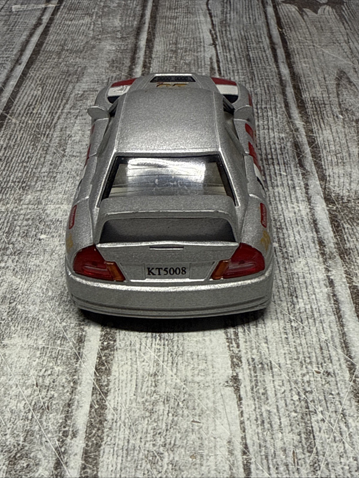 Kintoy Racing Silver Mitsubishi Evolution IV Toy Car Pull Back Die Cast 1:41