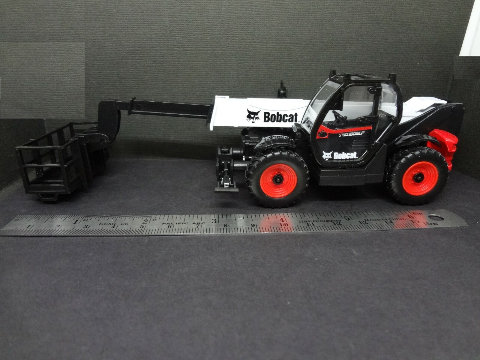 BOBCAT telescopic handler with man platform – Construction Warehouse