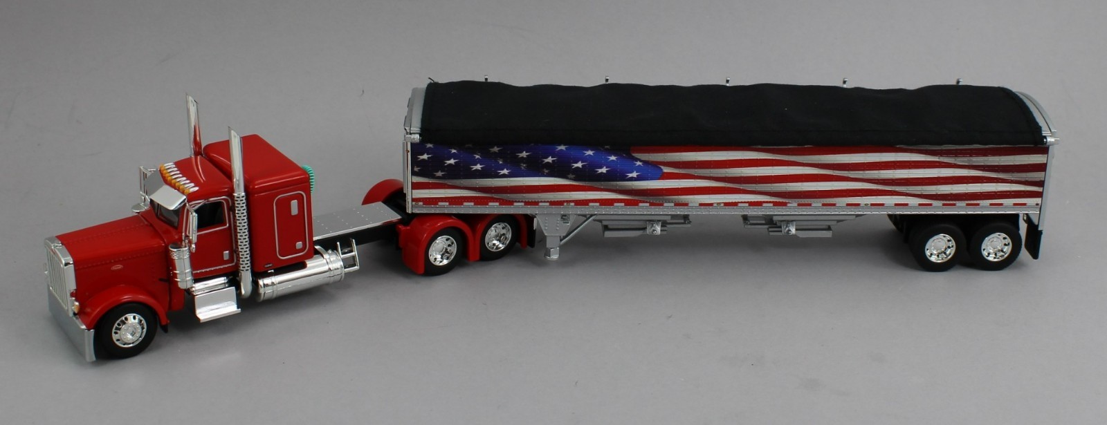 DCP 1:64 *RED AMERICA 250* Peterbilt 389 48″ Flattop w/Wilson Grain Trailer NIB