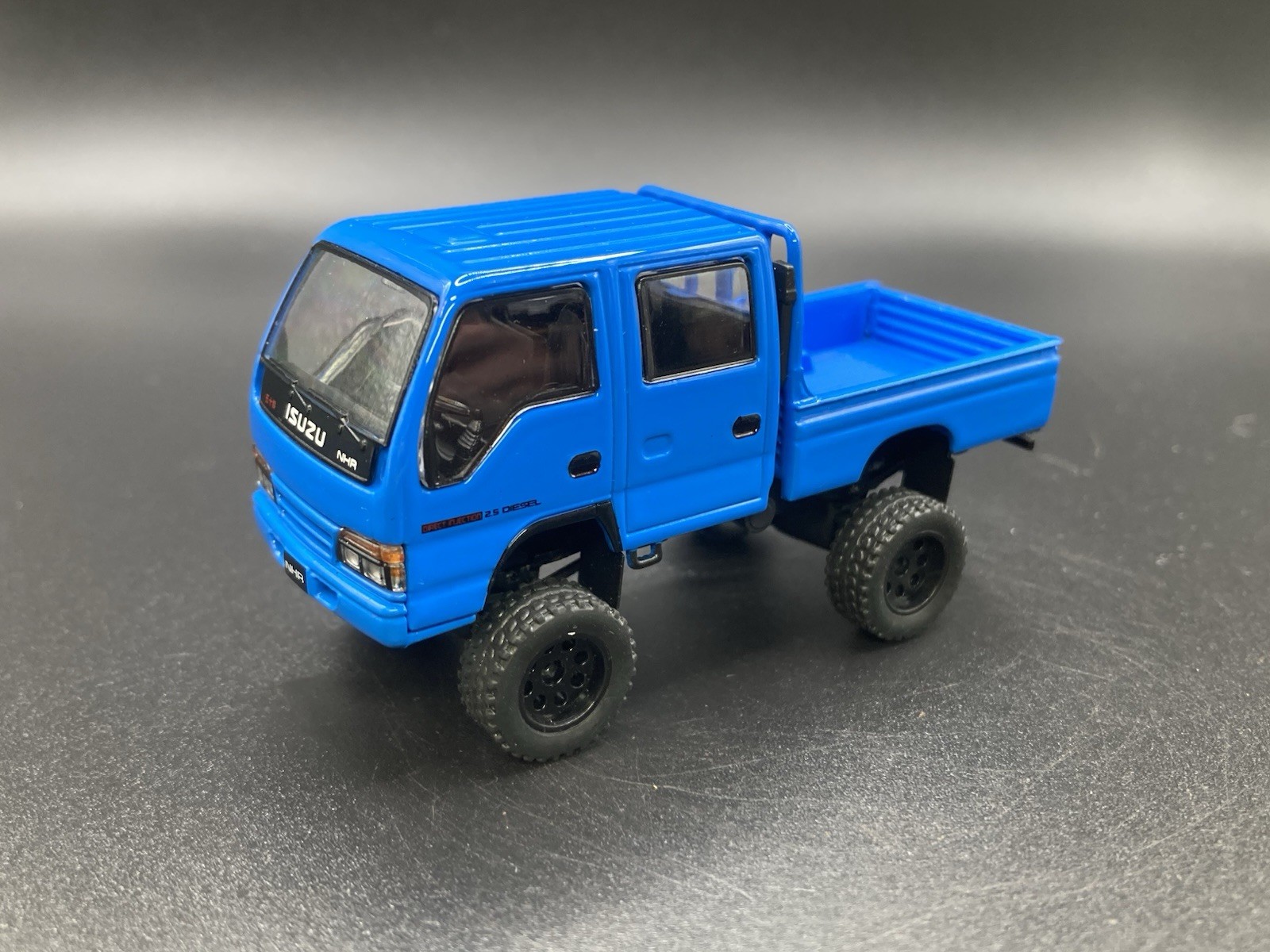 Isuzu NHR Lifted 4×4 Pickup Truck 1/64 Scale Massdi Diecast Custom Model1
