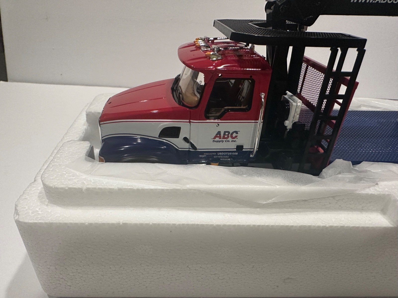 First Gear Mack Granite Material Handler w/Extended Boom ABC Supply 1/34 10-4272