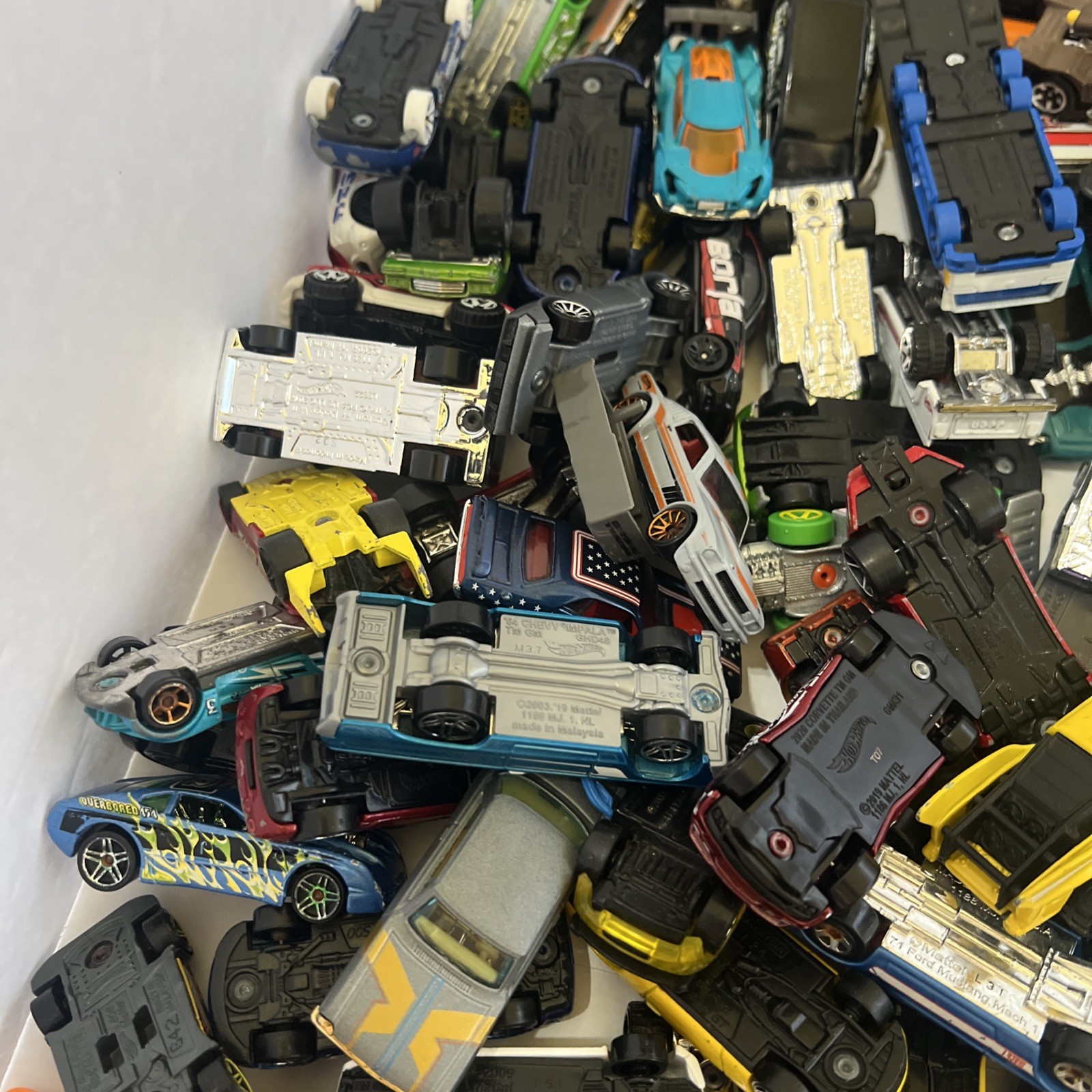 30 LBS Pounds of pure hotwheels. There are many different years and castings.