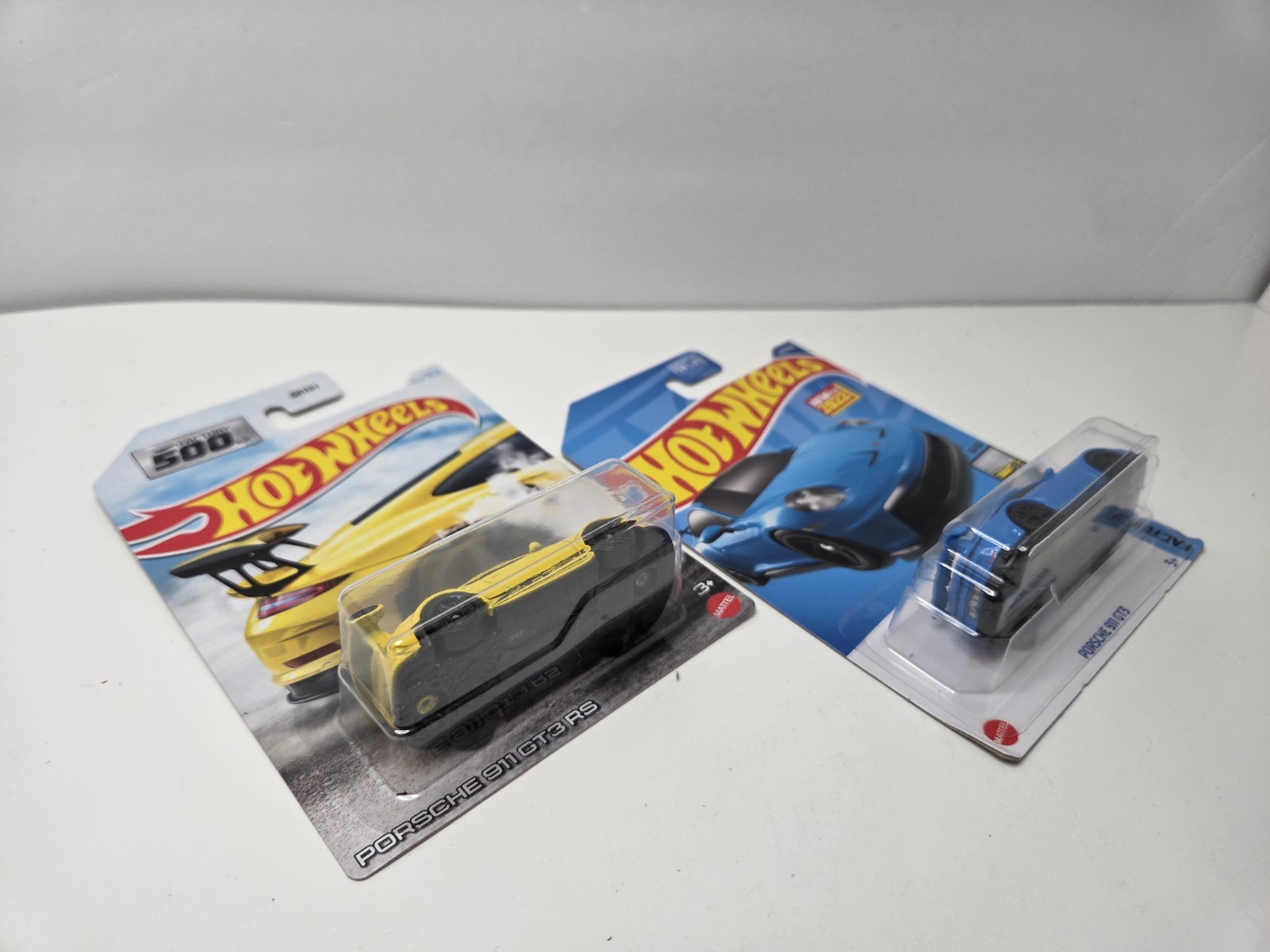 Hot Wheels Porsche 911 GT3 RS yellow Factory 500 And Blue New For 2023 Lot Of 2