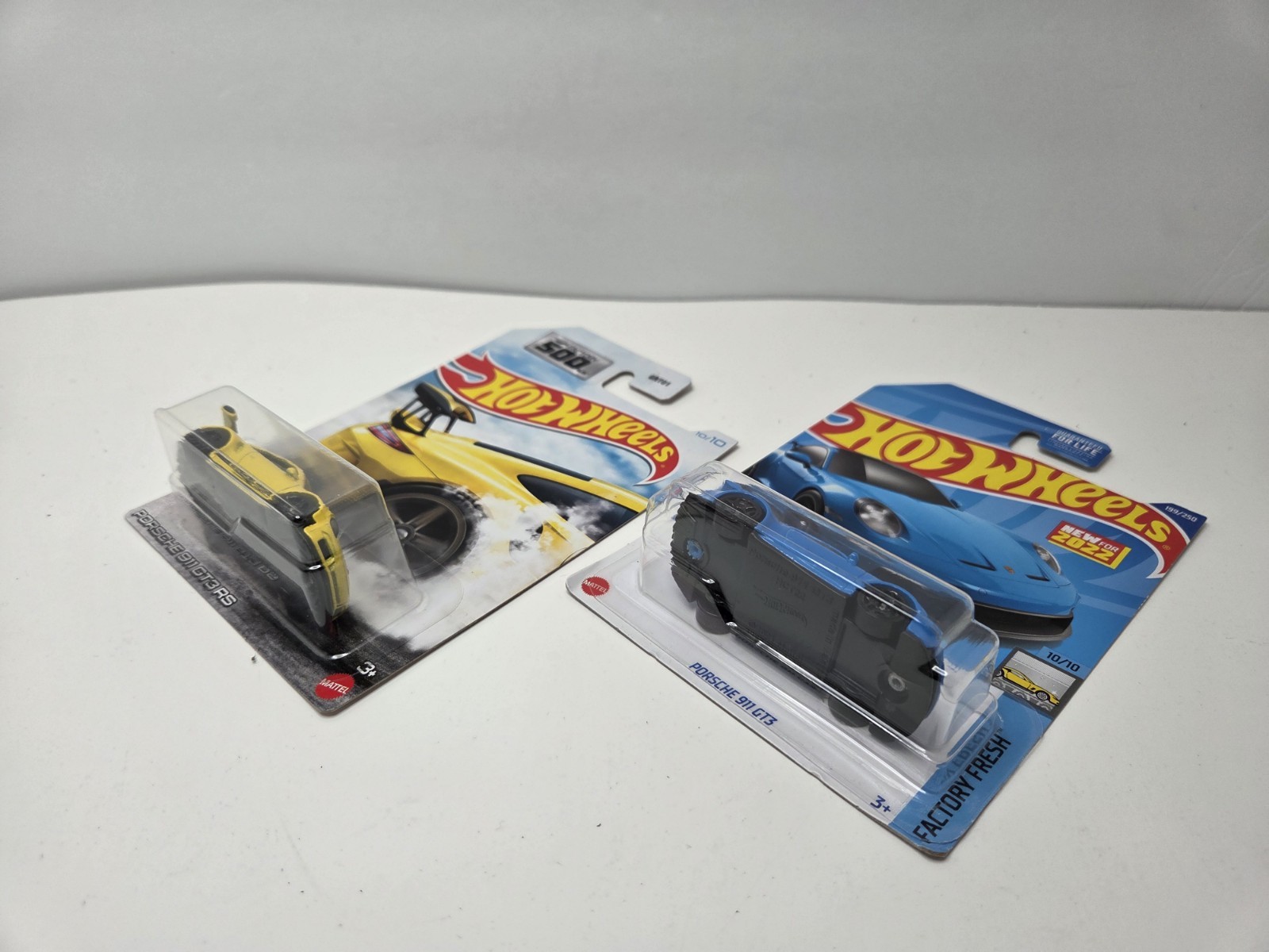 Hot Wheels Porsche 911 GT3 RS yellow Factory 500 And Blue New For 2023 Lot Of 2