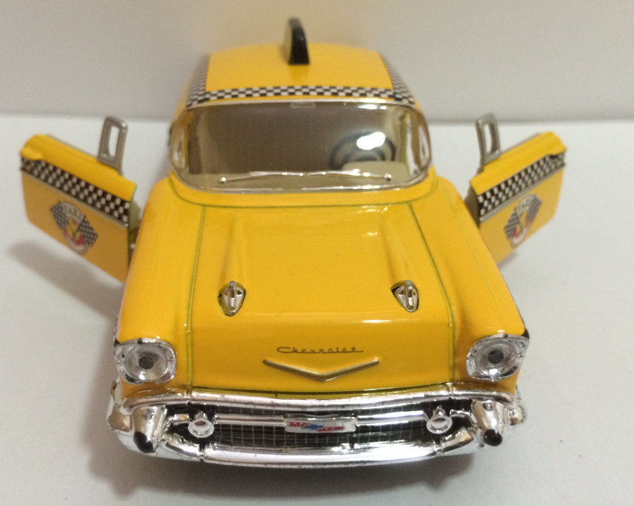 Diecast 1957 Chevrolet Bel-Air Taxi 1:40 Scale with Opening Doors And Pull Back
