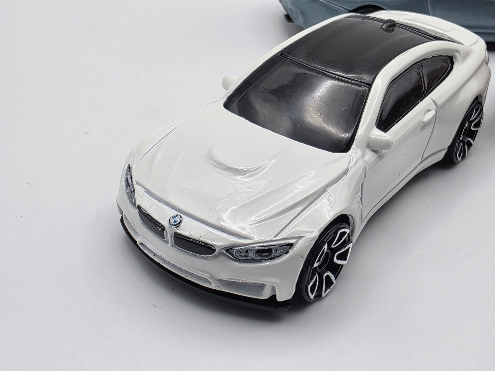 LOT OF (3) LOOSE HOT WHEEL BMW M4 IN LIGHT BLUE METALIC, WHITE AND BURGUNDY