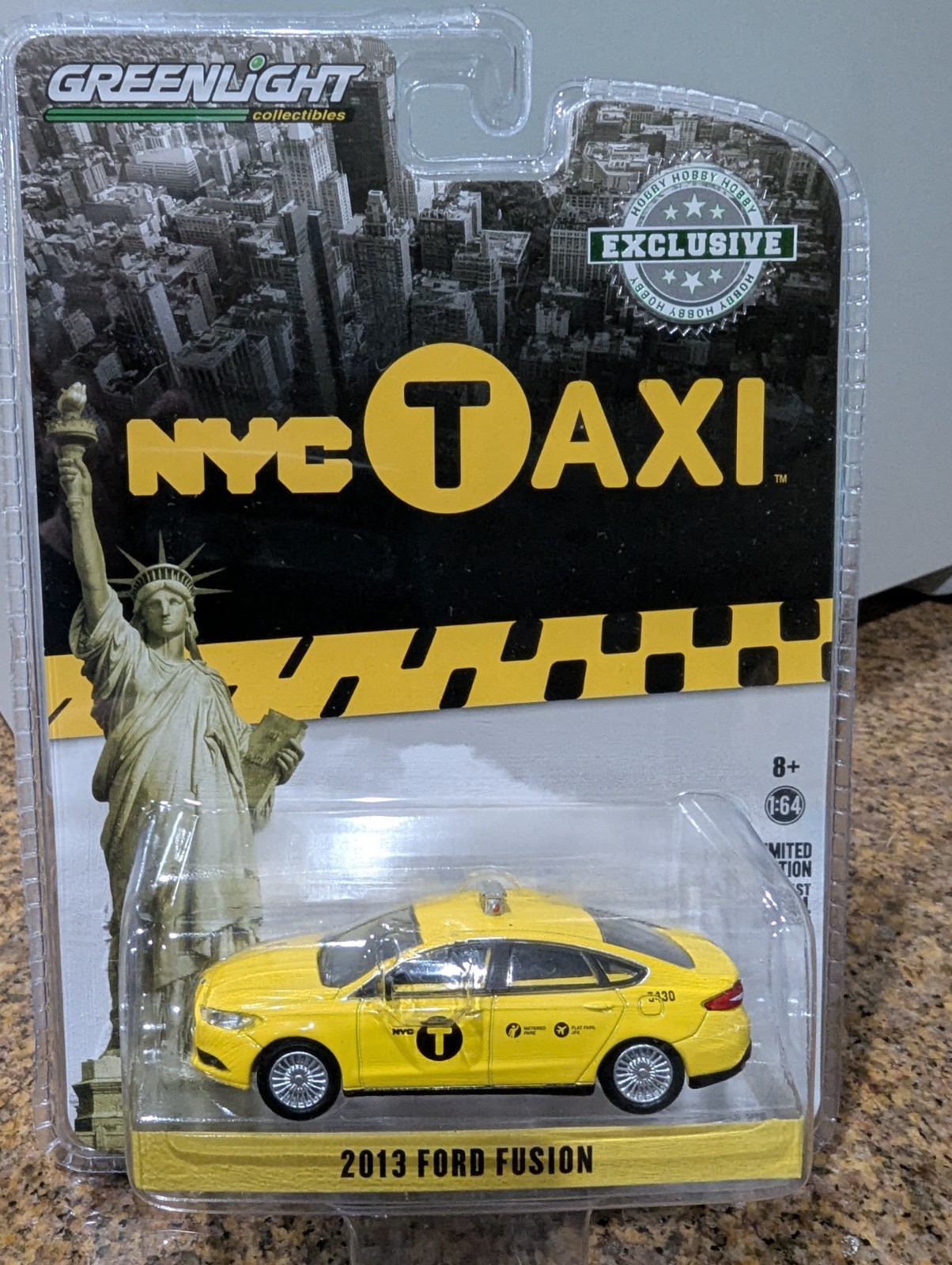 Greenlight 2013 Ford Fusion Taxi Cab NYC New York City Yellow 1/64 Scale MOC