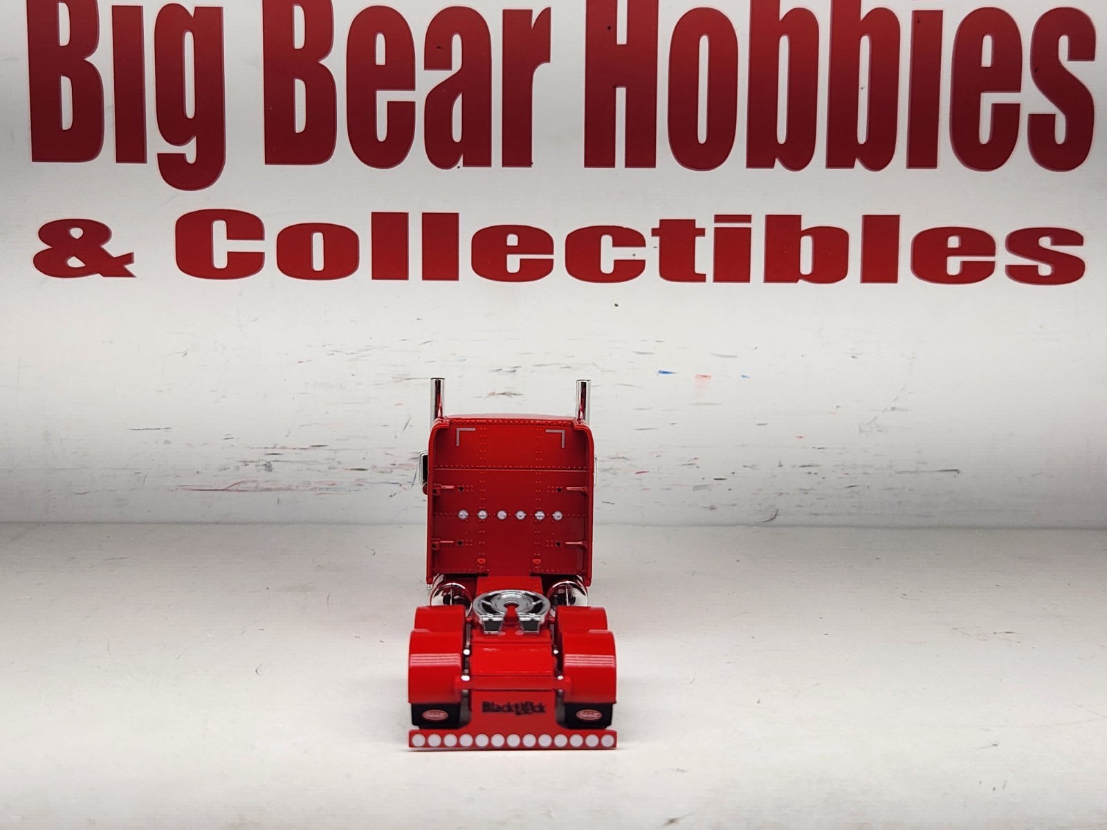1/64 New DCP Red 589 Peterbilt 70″ Midroof Sleeper Blackjack