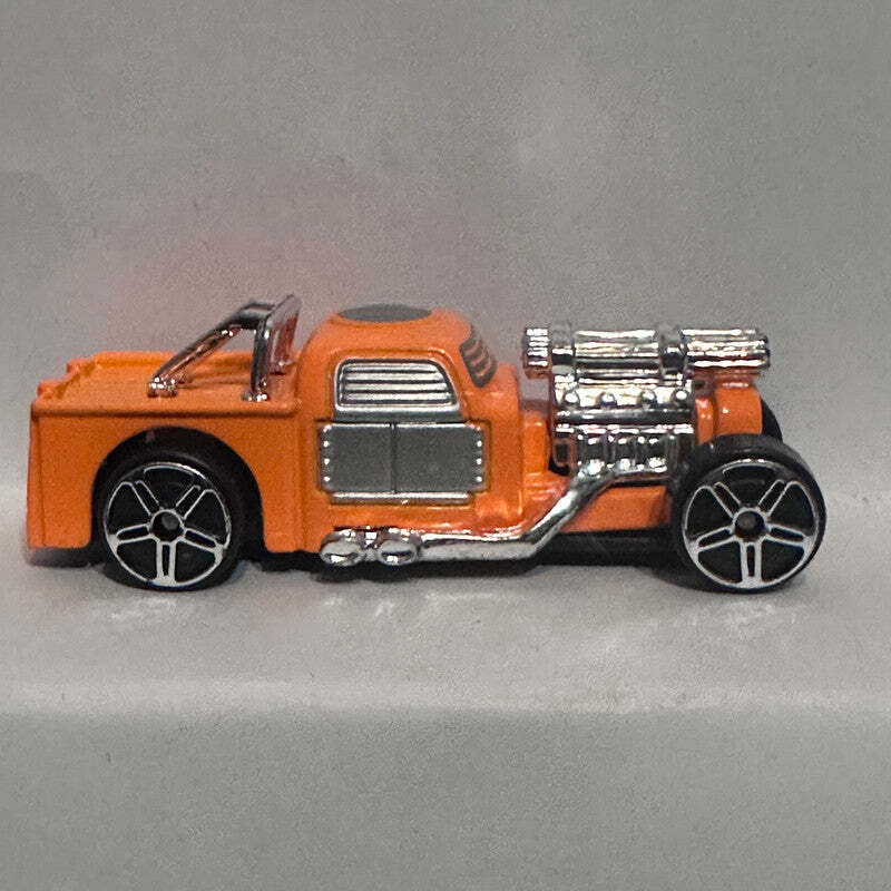 Orange Leadslinger Maisto Diecast Car