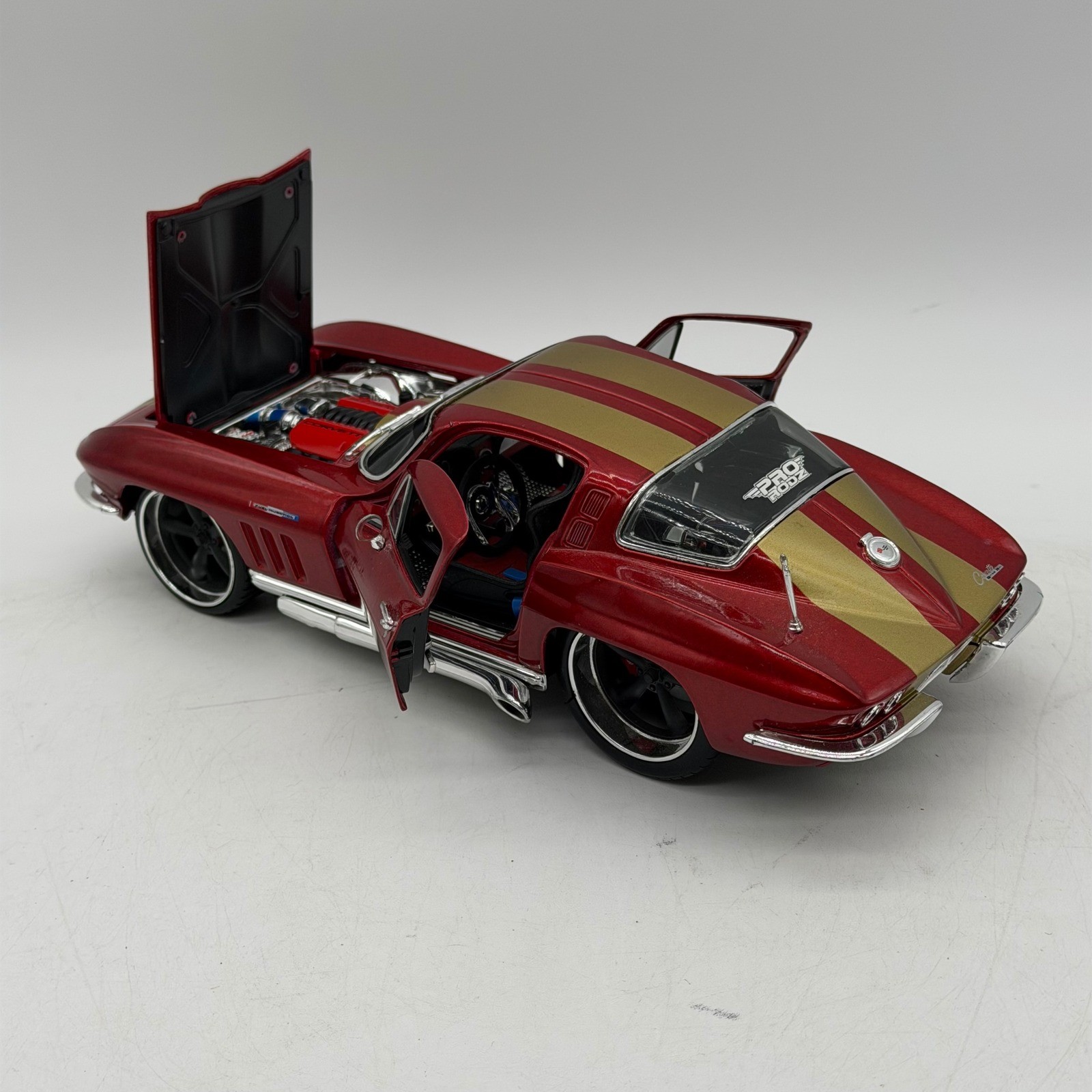 Maisto Pro Rodz 1965 Chevrolet Corvette 1/18 Red/Gold Racing Stripes Diecast Car