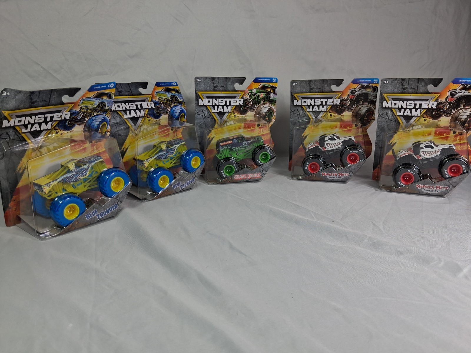 Lot of 5 Monster Jam 1:64 Diecast Trucks Blue Thunder Grave Digger Monster Mutt