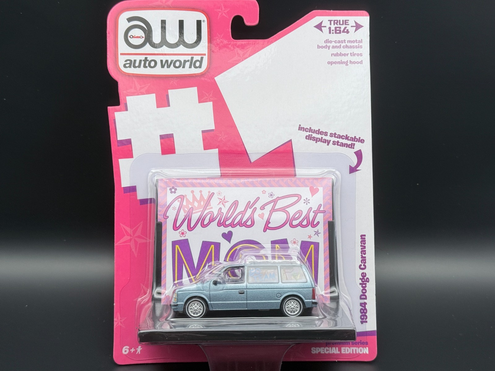 Auto World 1984 Dodge Caravan Blue World’s Best 1/64