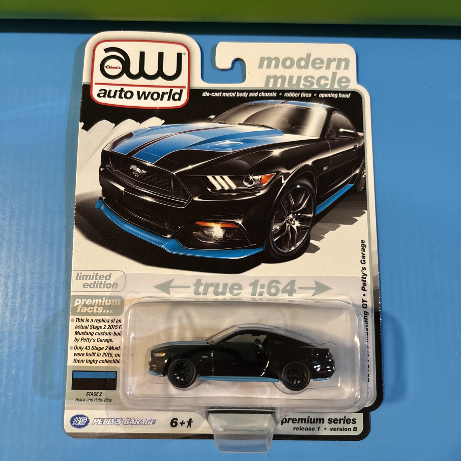 Auto World 2015 Ford Mustang GT Petty Garage *Black and Petty Blue*