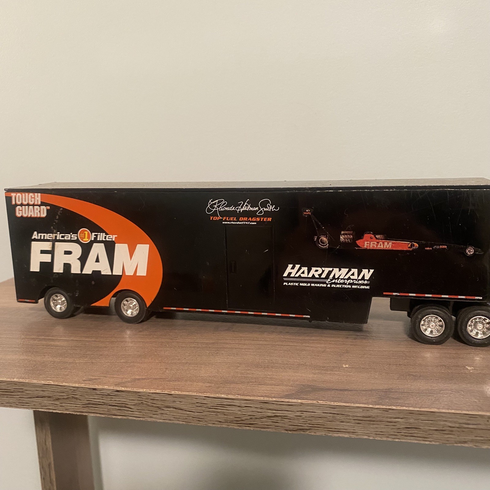 TFD Rhonda Hartman Smith FRAM Semi Freightliner Tractor Trailer Diecast Orange