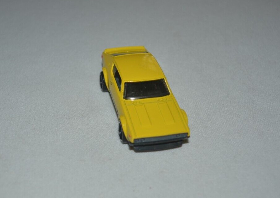 HOT WHEELS THEN AND NOW – NISSAN SKYLINE 2000 GT-R YELLOW LOOSE FREE SHIPPING