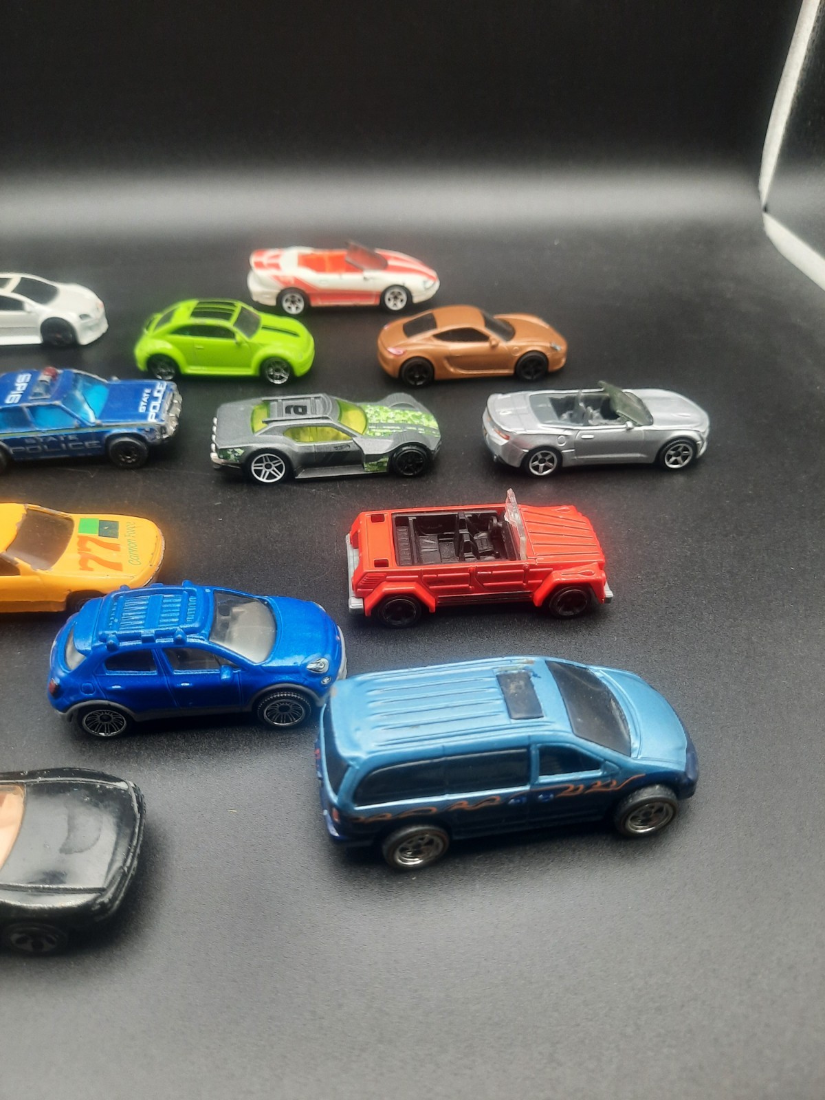 Mixed lot of 17 hot wheels/matchbox cars. Vintage to modern. Most fair shape.