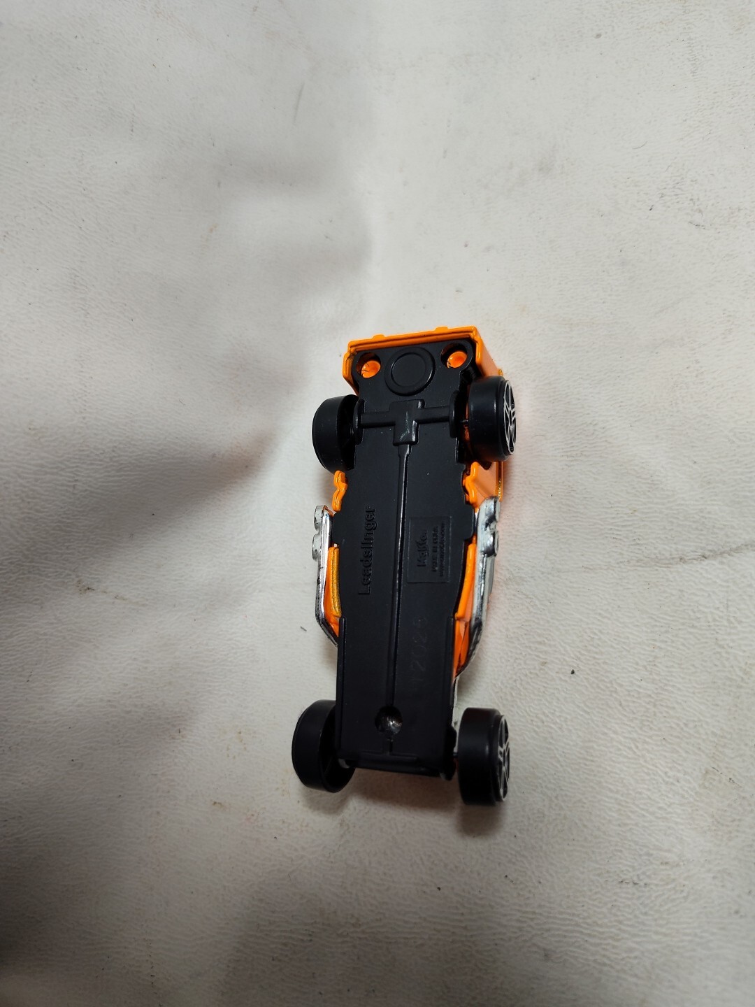 Orange Maisto Leadslinger 1:64 Scale Vehicle