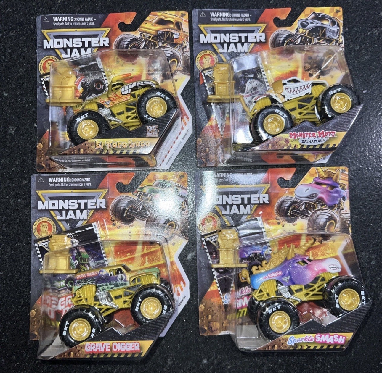 BRAND NEW! 2026 MONSTER JAM GOLD TROPHY TRGX SERIES #01 SET OF 4