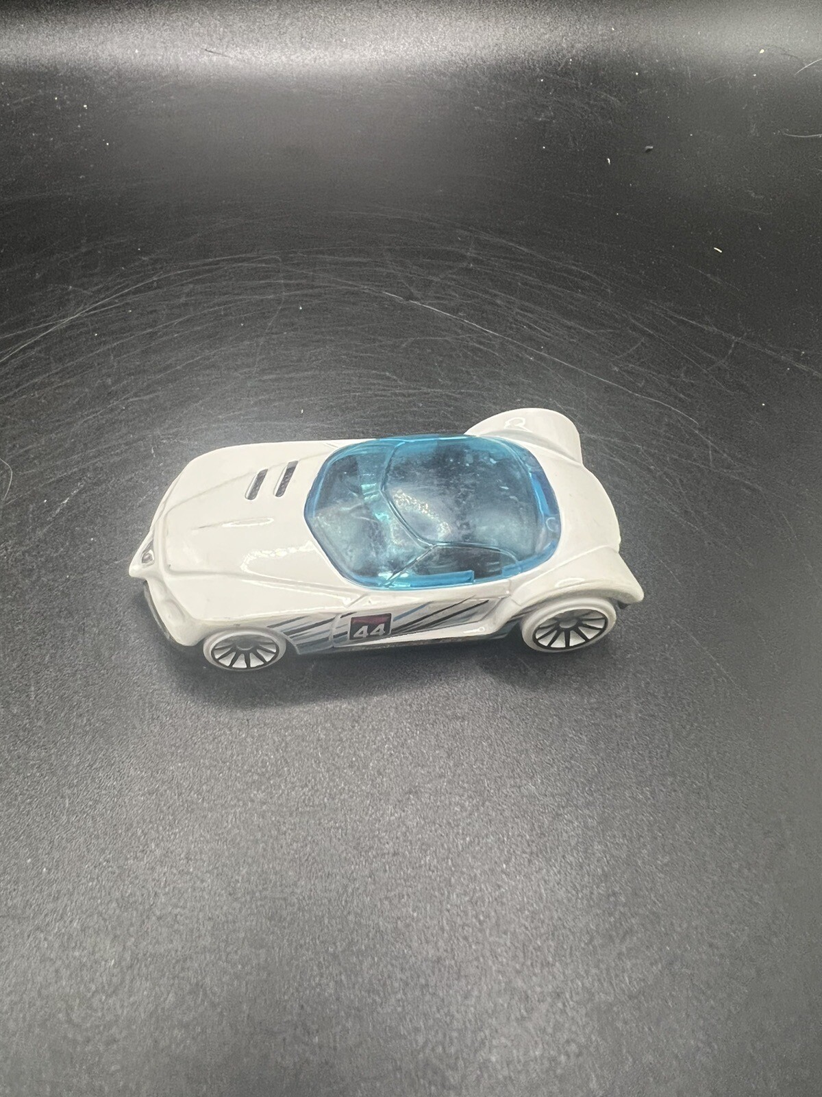 Hot Wheels Golden Arrow Toy Car White with Light Blue and Black Stripes 2016